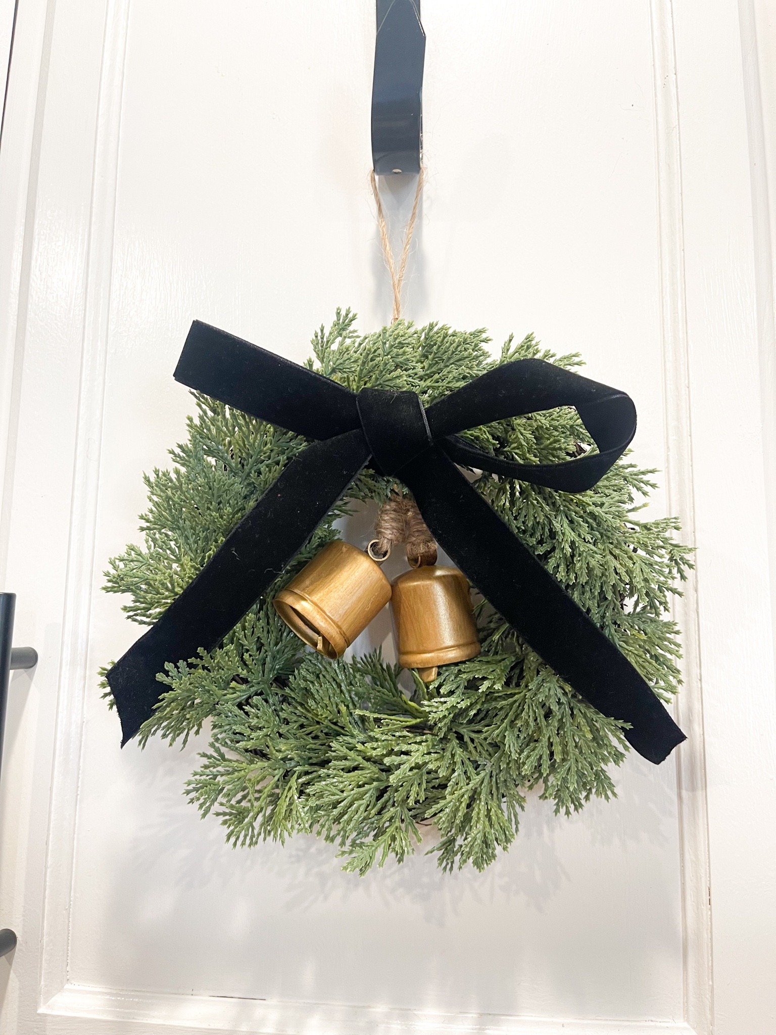 Christmas Mini wreath with velvet bow and gold bells. Kitchen cabinet decor. Kitchen Christmas. Norfolk wreath. Christmas diy decor.

#LTKHoliday #LTKHolidaySale #LTKhome