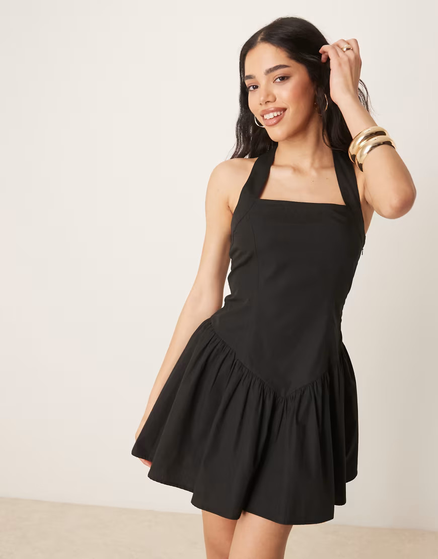 ASOS DESIGN halter mini dress with ruffle hem in black | ASOS (Global)