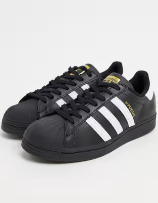 adidas Originals Superstar sneakers in black and white | ASOS (Global)