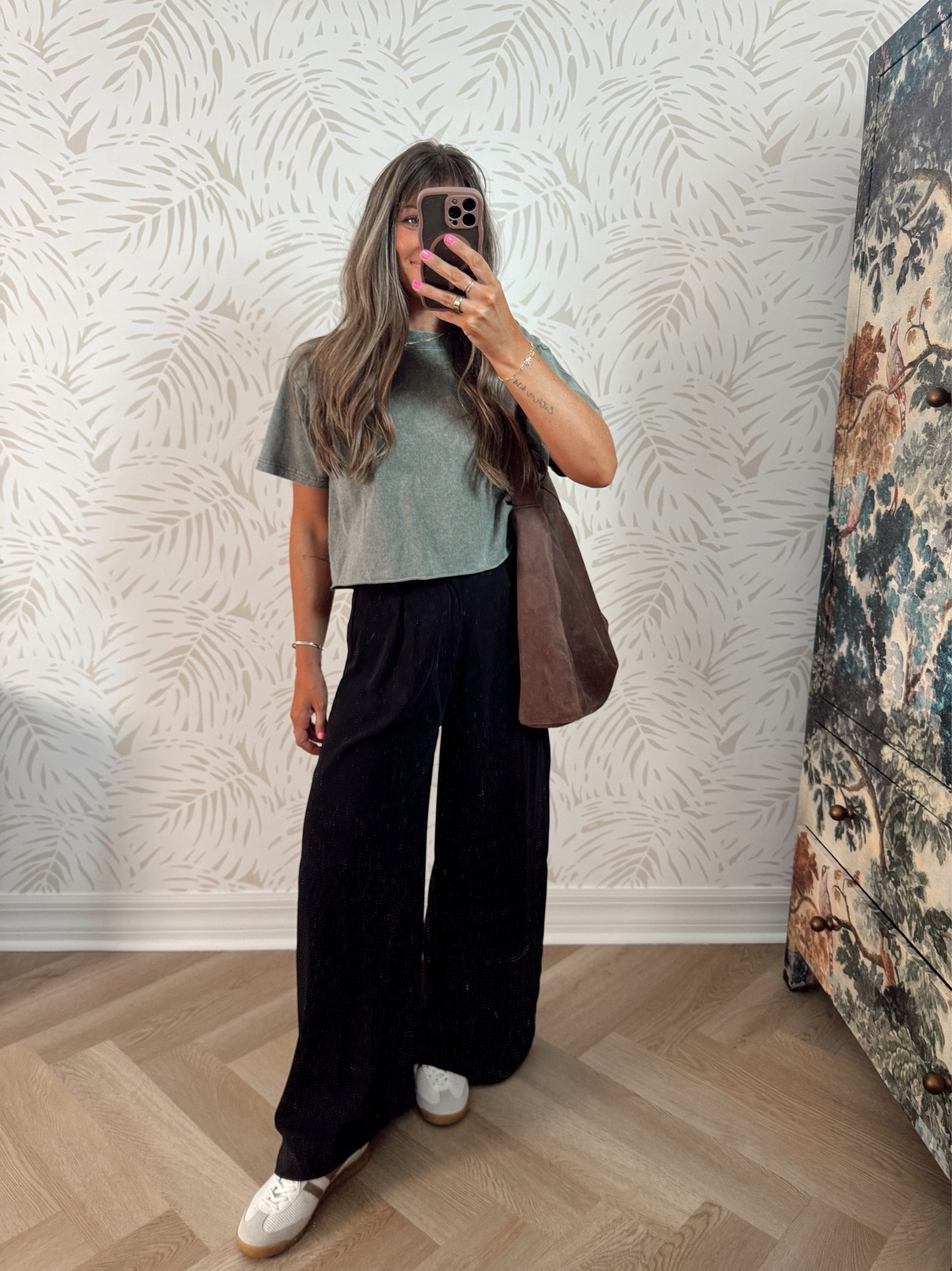 These trousers have been a closet staple for me for YEARS now. Highly recommend! I love the red around the holidays too - I’d grab now if you can!! They dress up stunning with heels and have the perfect cool girl look so effortlessly with sneakers too!
