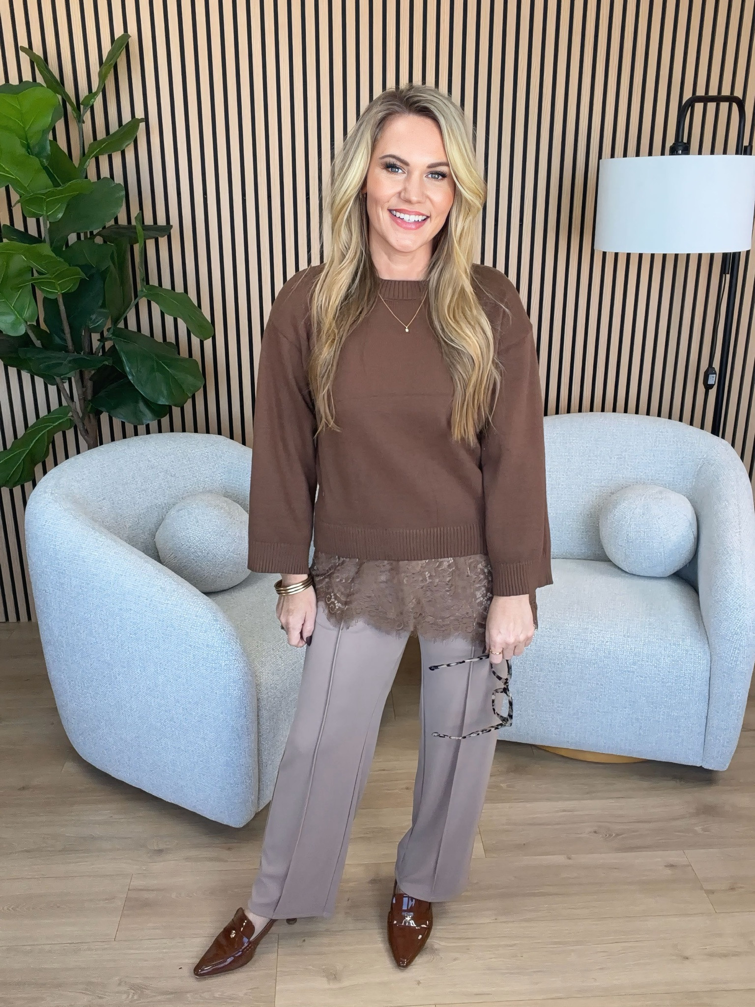 Chocolate brown is having its moment in my fall wardrobe! This relaxed brown sweater with the delicate lace hem is such a pretty mix of casual and feminine. I paired it with taupe trousers, cognac pointed toe loafers, and my favorite statement glasses for a neutral look that works for the office or everyday wear. I especially love the lace detail peeking out beneath the sweater!

Sizing: 5’3” | Medium sweater | Size 6 trousers | Size 7.5 shoes

Chocolate brown sweater, lace trim sweater, brown fall outfit, taupe trousers, women’s fall workwear, cognac loafers, neutral fall fashion, business casual outfit, petite office style, oversized eyeglasses, feminine fall outfits, Audrie Dollins