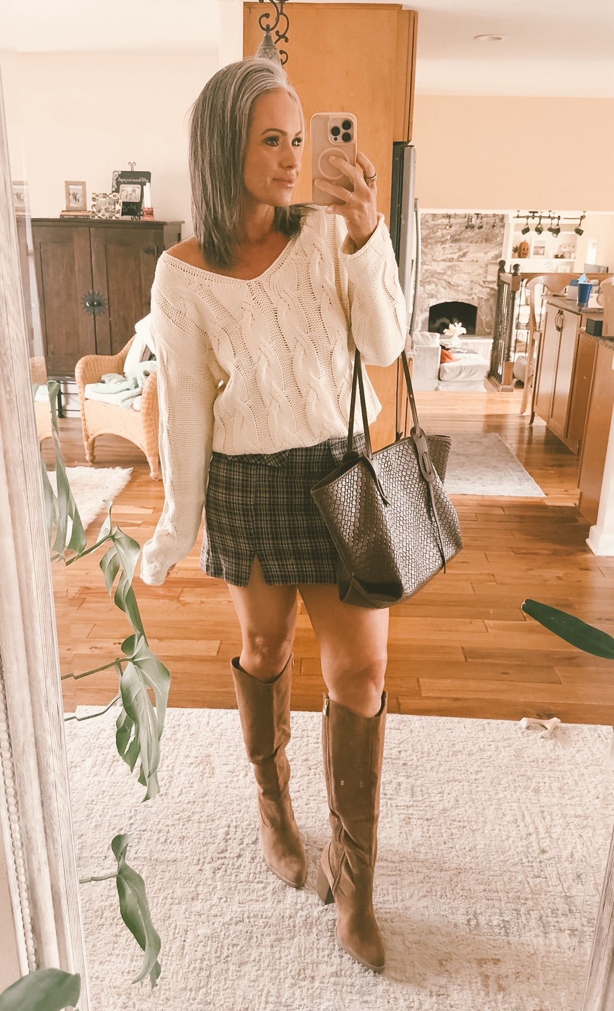 Sweater :oversized in a small
Skirt: tts small has shorts underneath 
Boots: sized up half a size 
Used my adjustable waist band thing to crop it :)
#blackfridaydeals #amazonblackfriday #falloutfit #skirtandboots 

#LTKOver40 #LTKootd #LTKSeasonal