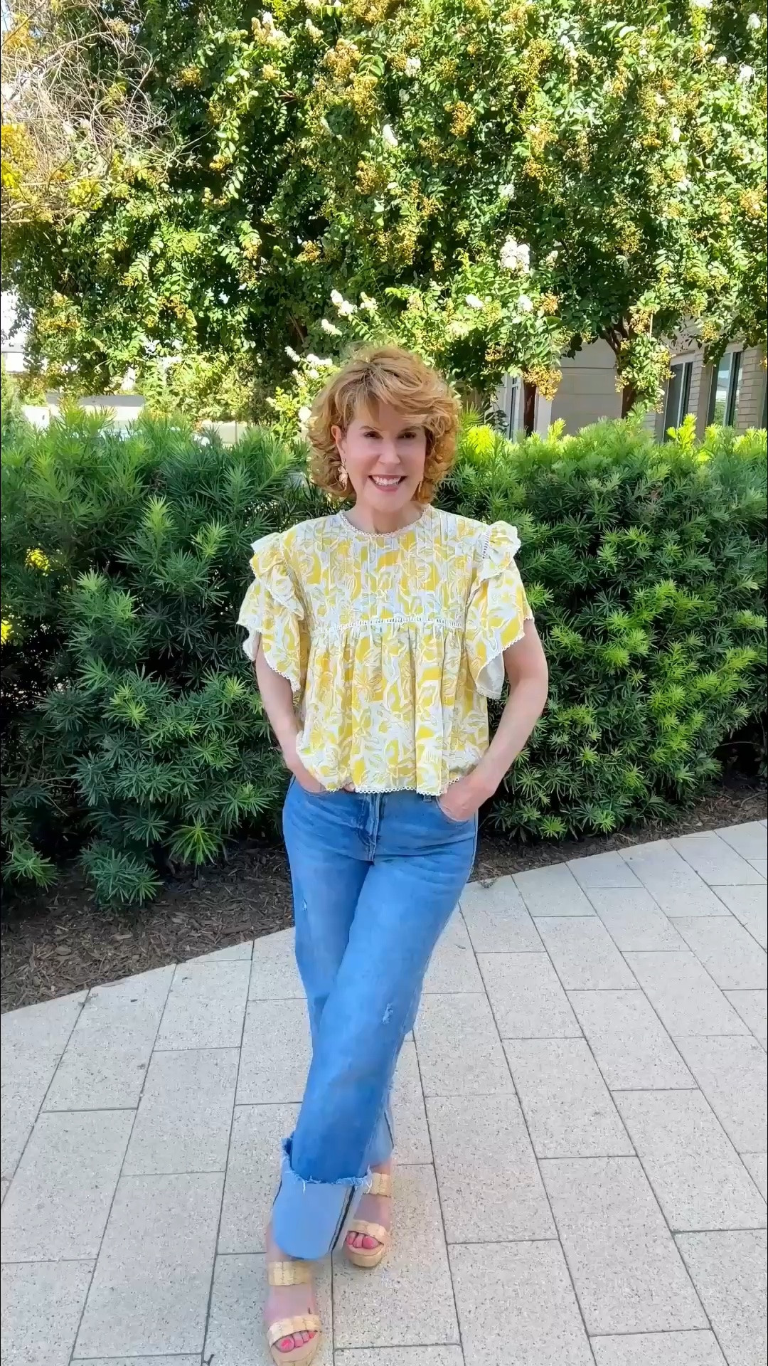 This yellow floral top is such a happy little piece! I love the flutter sleeves, pretty lace details, and relaxed fit—and it looks just as cute with cuffed jeans as it would with white denim or shorts. Easy, feminine, and perfect for lunch with friends or a casual weekend out.

#LTKootd #LTKOver40 #LTKSeasonal