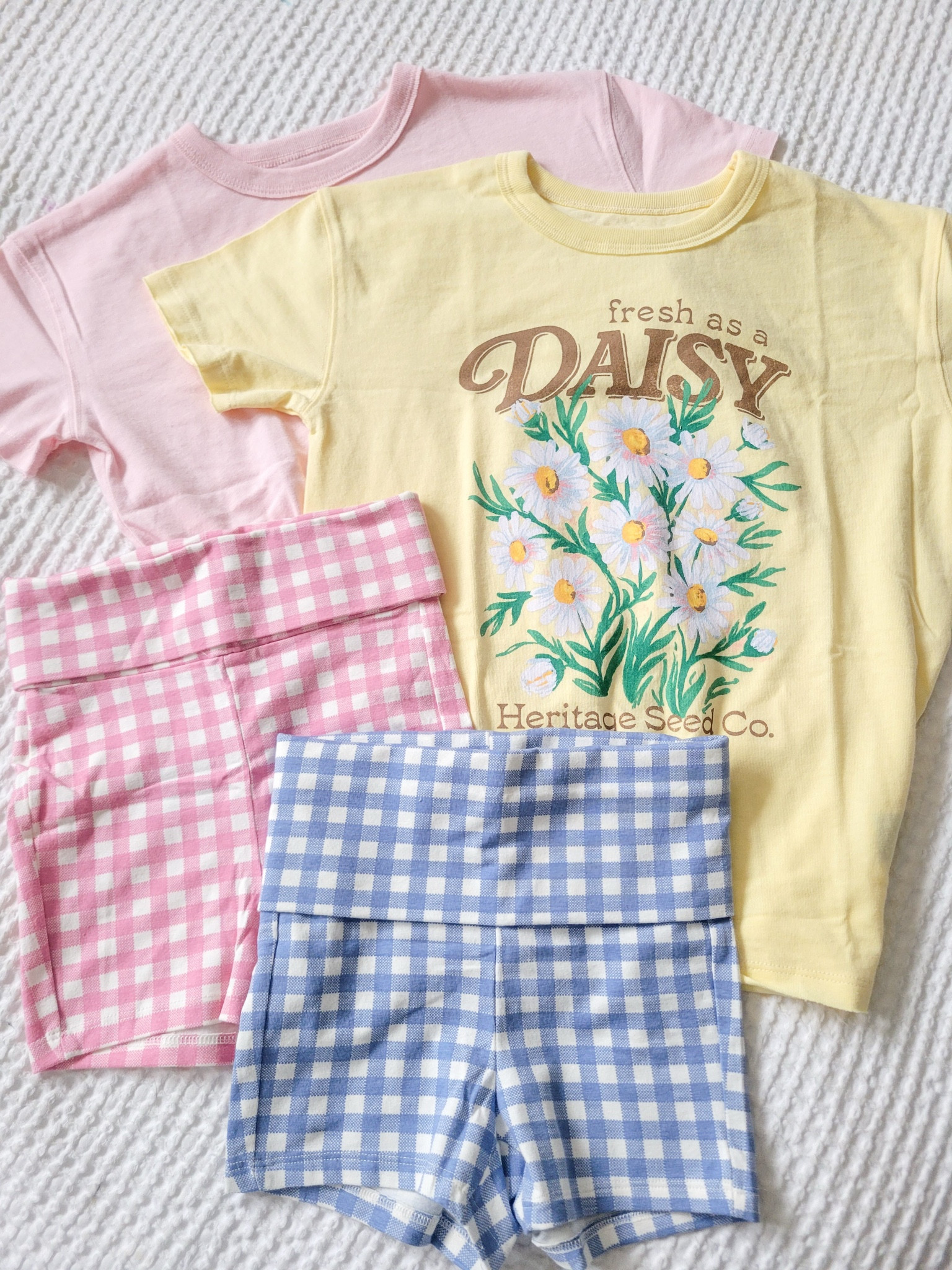 Girls biker shorts and oversized graphic tshirts. Cute spring summer outfits. Easy outfits. Girl mom. Old navy sale. Gingham. Tween teen girls. 

 #LTKmomlife #LTKSaleAlert #LTKKids