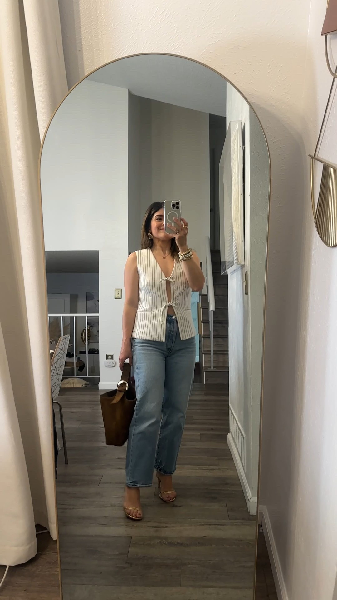 I’m currently slightly obsessed with these jeans! They run tts, I’m wearing size 25. 
Vest size xs. Take 25% off my vest + an additional 15% off with code MYAF15

#LTKSaleAlert #LTKFindsUnder100 #LTKSeasonal