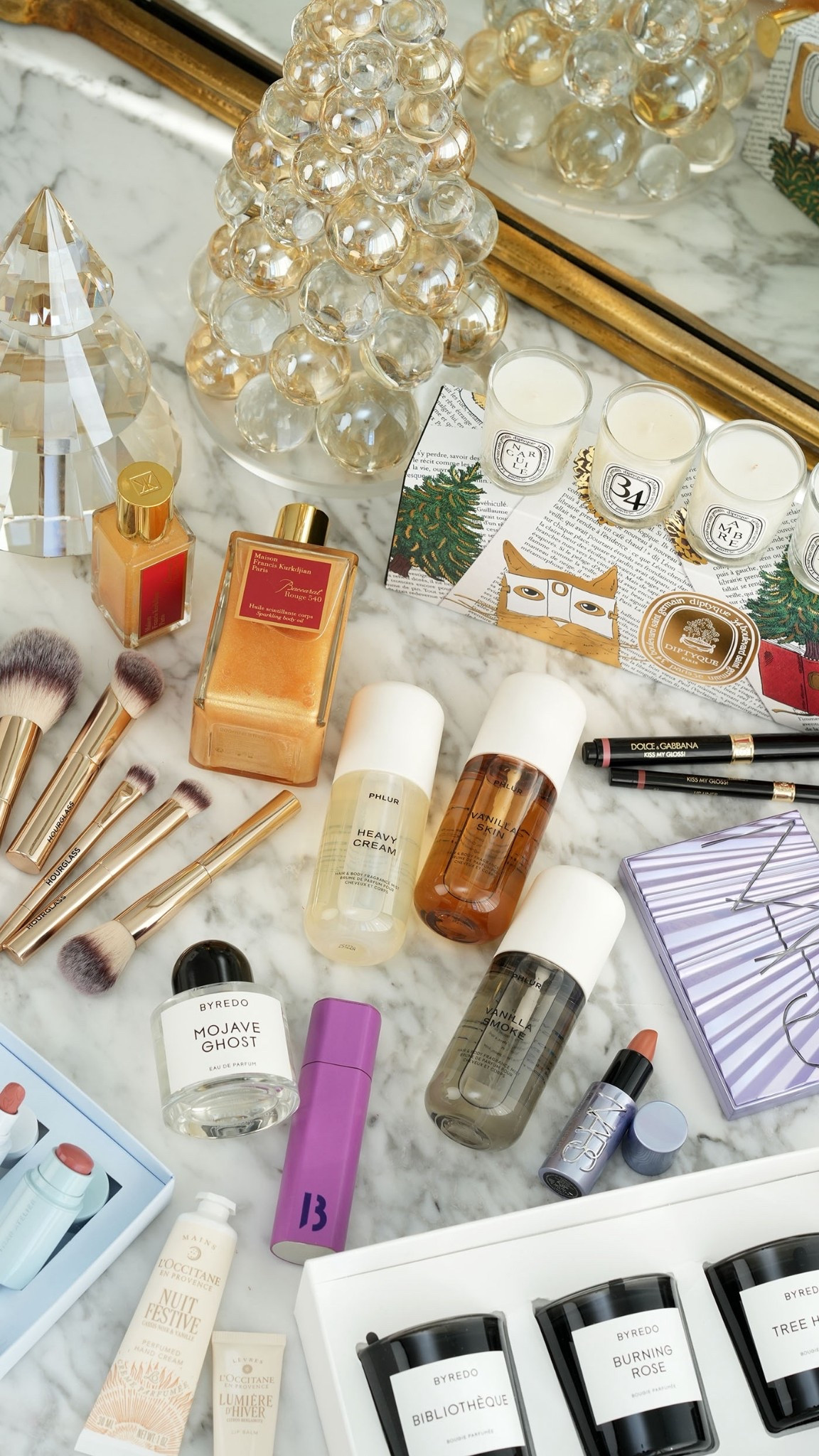 Sharing my first Holiday Gift Guide for the beauty lover with finds from @nordstrombeauty

Hourglass Travel Brush Set
Baccarat Rouge 540 Sparkling Body Oil
also available in a mini as part of a trio (linked in my LTK)
L’Occitane Hugs + Kisses Duo (this is under $25)
Jo Malone Holiday Favorites Set
Westman Atelier Mini Petal Set
Dolce & Gabbana Kiss My Gloss! Duo in Whisper
Phlur Mini Trio
Byredo and Diptyque Candle sets

#NordstromPartner 

#LTKGiftGuide #LTKHoliday #LTKBeauty