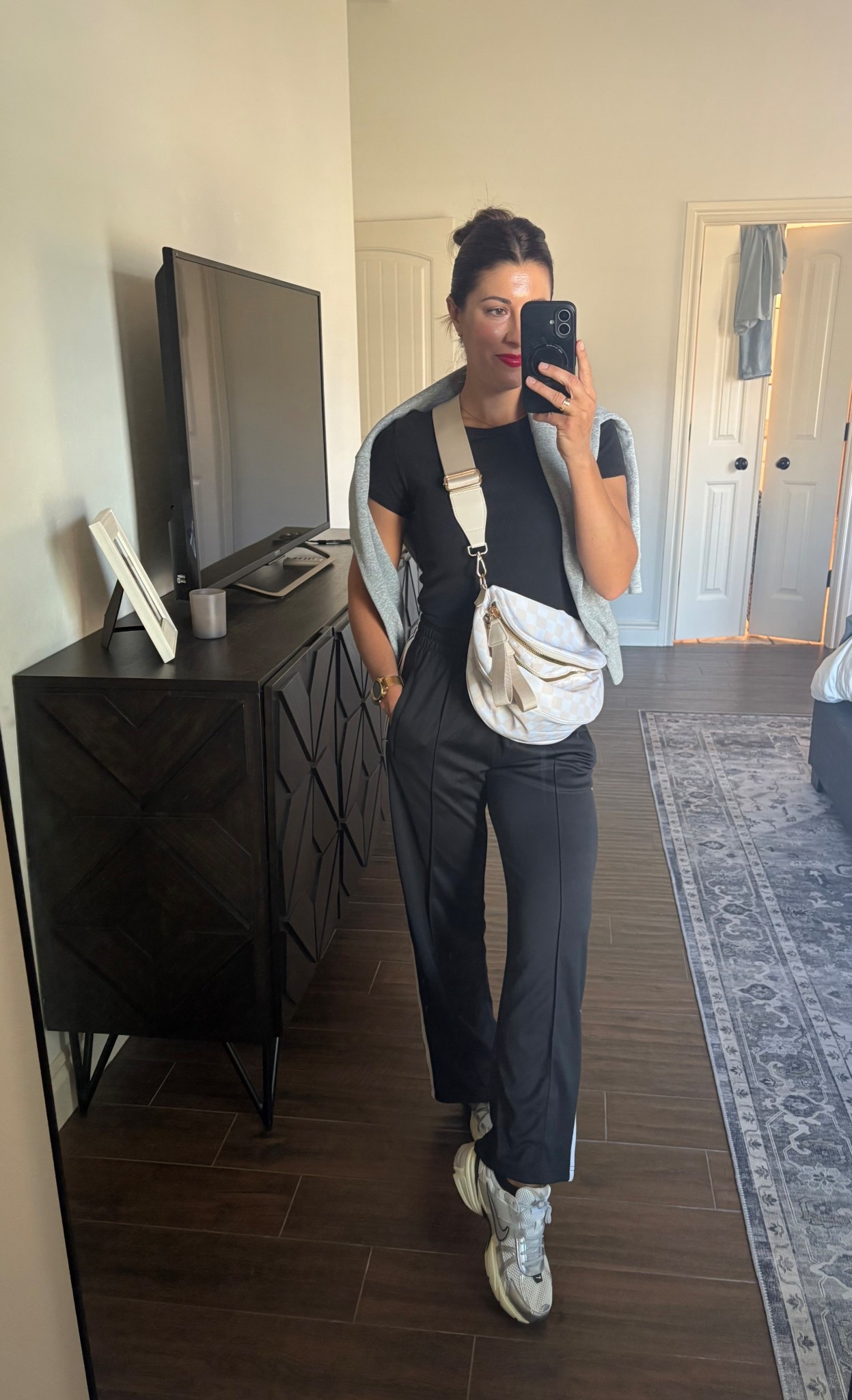 Amazon mom outfit! Love these pants for a change from leggings. And these Nikes are 💯 would also be cute w leggings /white ruffle high socks 