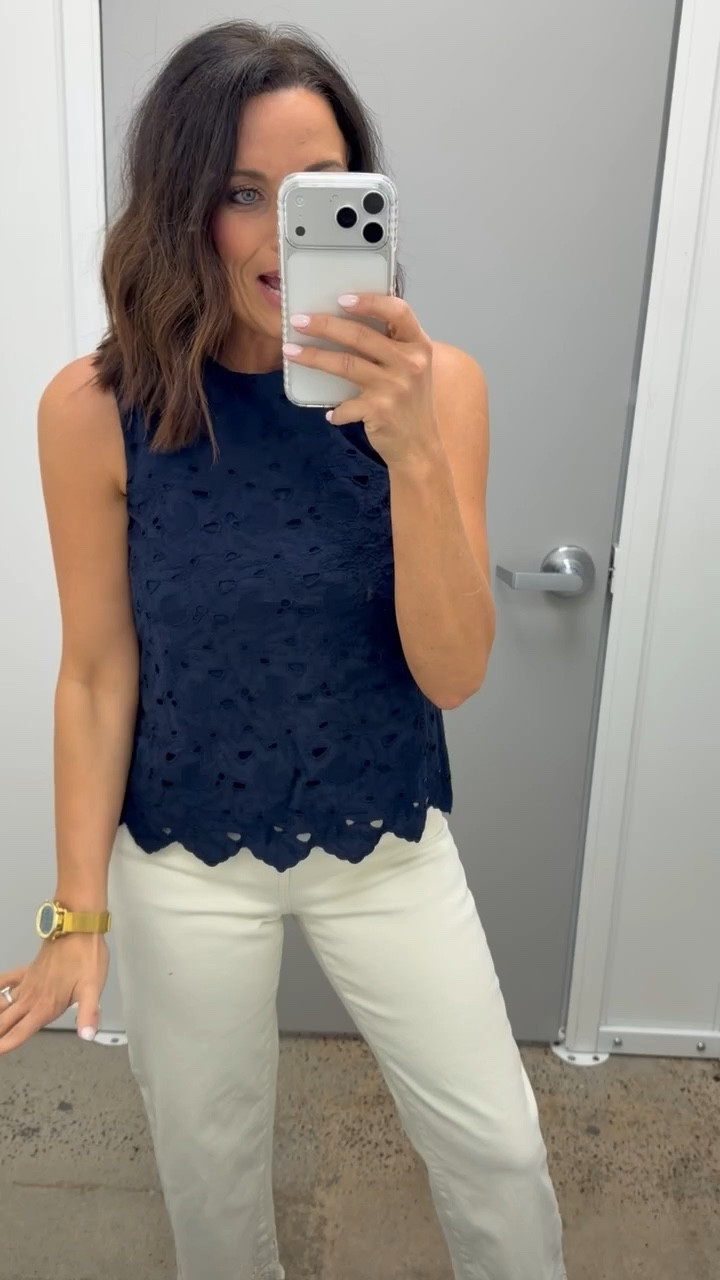 Such a chic spring outfit that’s giving all the J.Crew vibes 🤍 This look is perfect for spring workwear while still feeling feminine and polished. The navy eyelet tank is such a beautiful piece — the eyelet detail makes it feel elevated while still being lightweight and comfortable for warmer days.

I paired it with these jeans that have the prettiest cream eyelet detail along the bottom, which adds such a unique and girly touch to the outfit. The contrast of the navy with the soft cream detailing is so pretty and perfect for spring.

This is such a great outfit for work, meetings, church, or any time you want to look a little more put together while still feeling comfortable. I love how feminine and classic this whole look feels.

Wearing an XS in the top and a regular size 2 in the bottoms for reference. Everything is linked here in my LTK 🤍

#LTKPetite