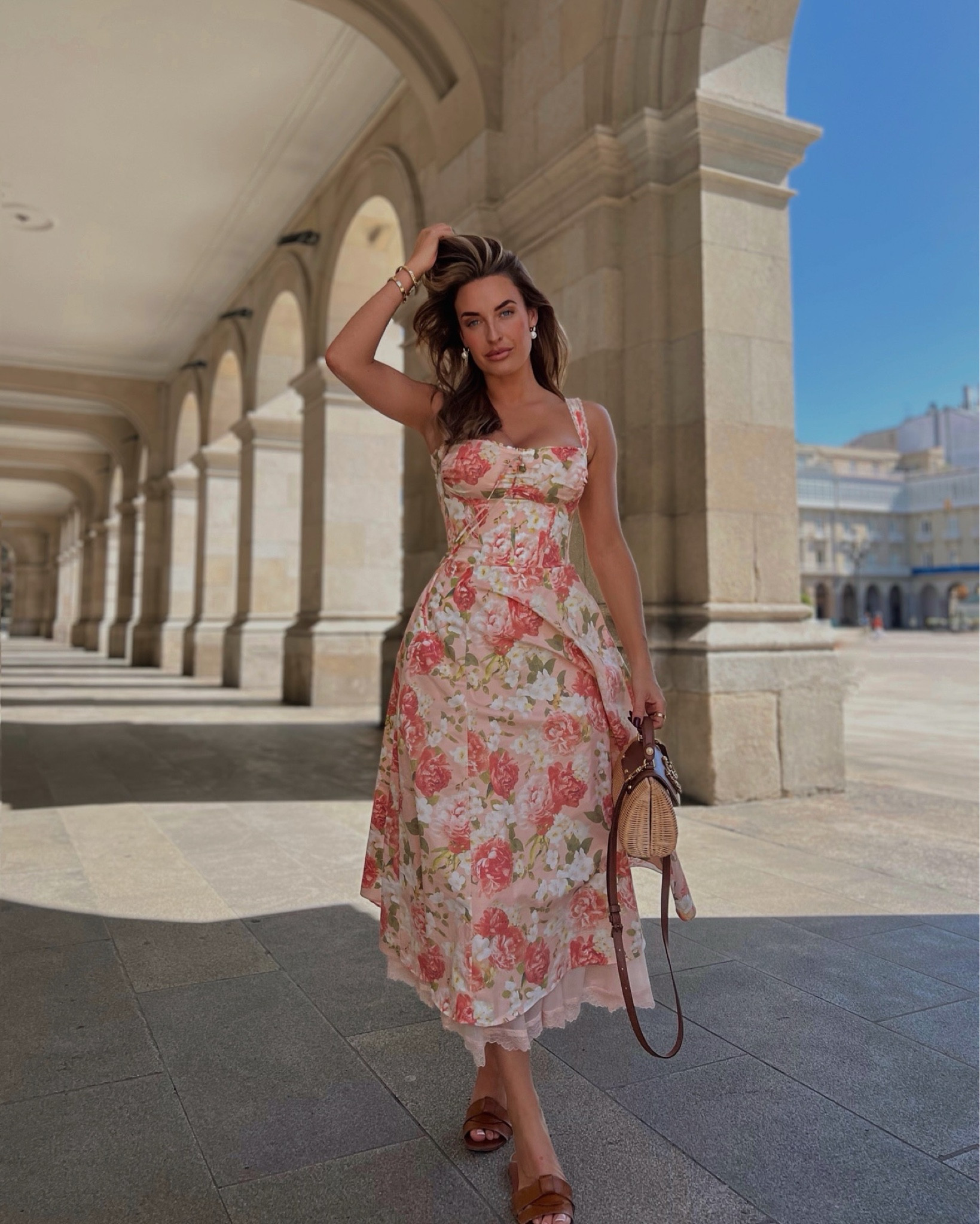 Pretty floral House of CB midi dress on the streets of A Coruna 🇪🇸 Corset waist & underskirt for extra shape 🤍

#LTKstyletip #LTKmodest #LTKtravel