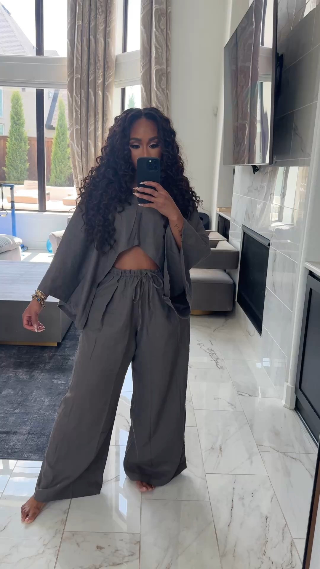 Asymmetric long sleeve crop top and flare leg pants set! Perfect vacation look!

#LTKMidsize #LTKStyleTip #LTKFindsUnder100