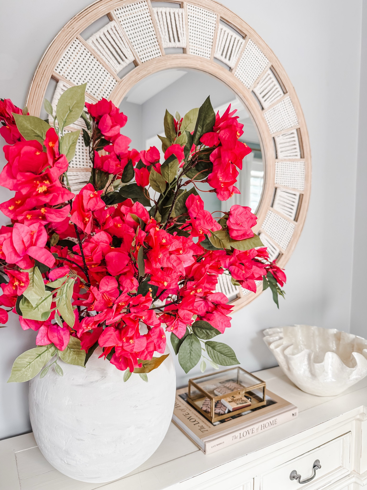 Bougainvillea branch 
Spring florals 
Entryway decor
Console table decor
Spring flower stem
Artificial Bougainville branch 
Spring faux stems
Glass display box
Coffee table book 

#LTKStyleTip #LTKSeasonal #LTKHome