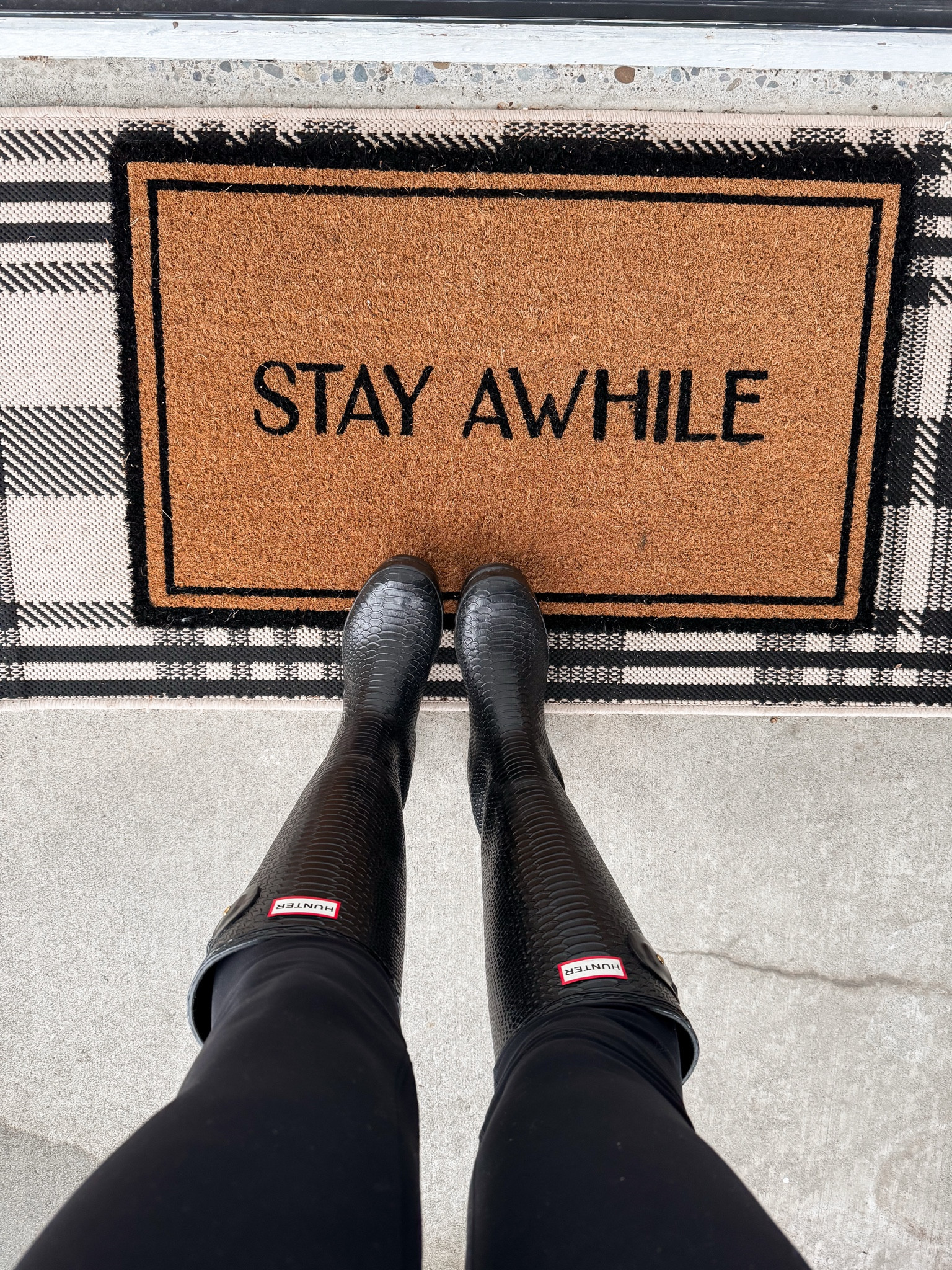 Welcome mat 
Hunter boots 
Fall style 

#LTKShoeCrush #LTKStyleTip #LTKSeasonal