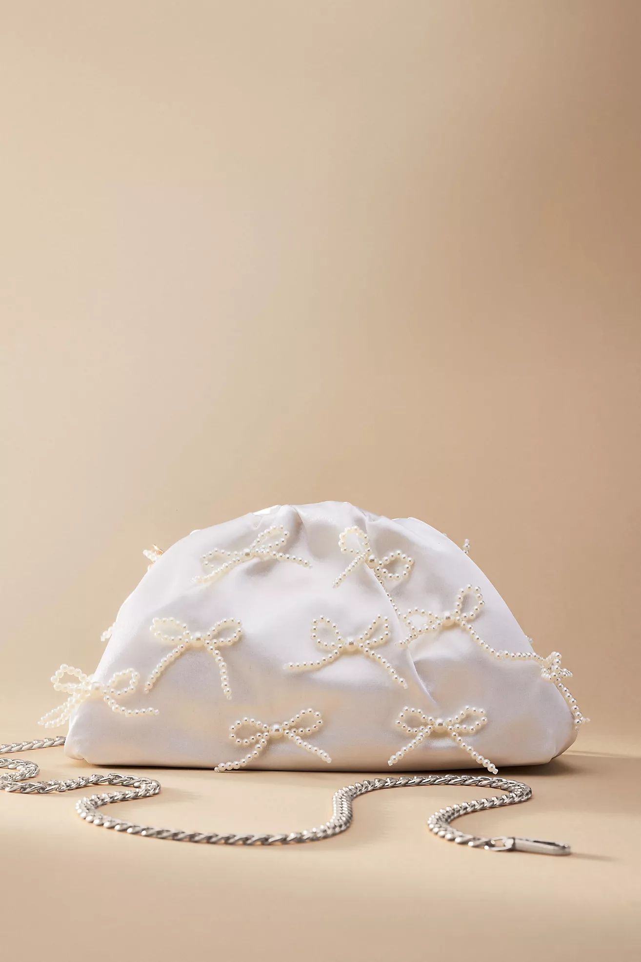 The Frankie Mini Clutch: Pearl Bows EditionBy Anthropologie WeddingsWrite a Review Reviews$98.00D... | Anthropologie (US)