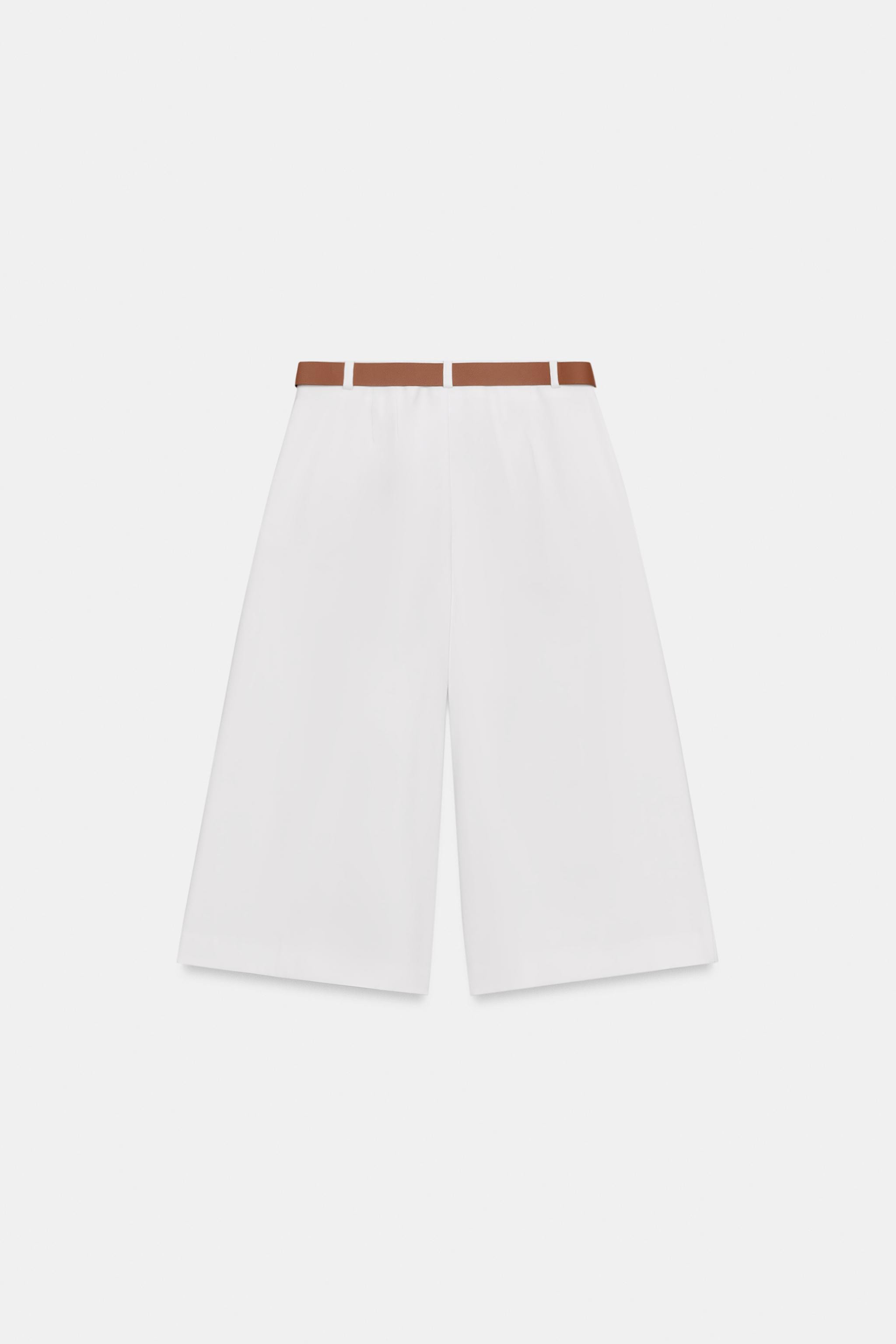 High-waisted Bermuda shorts with front pleats and a belt. Front pockets. Side hidden in-seam zip ... | Zara US