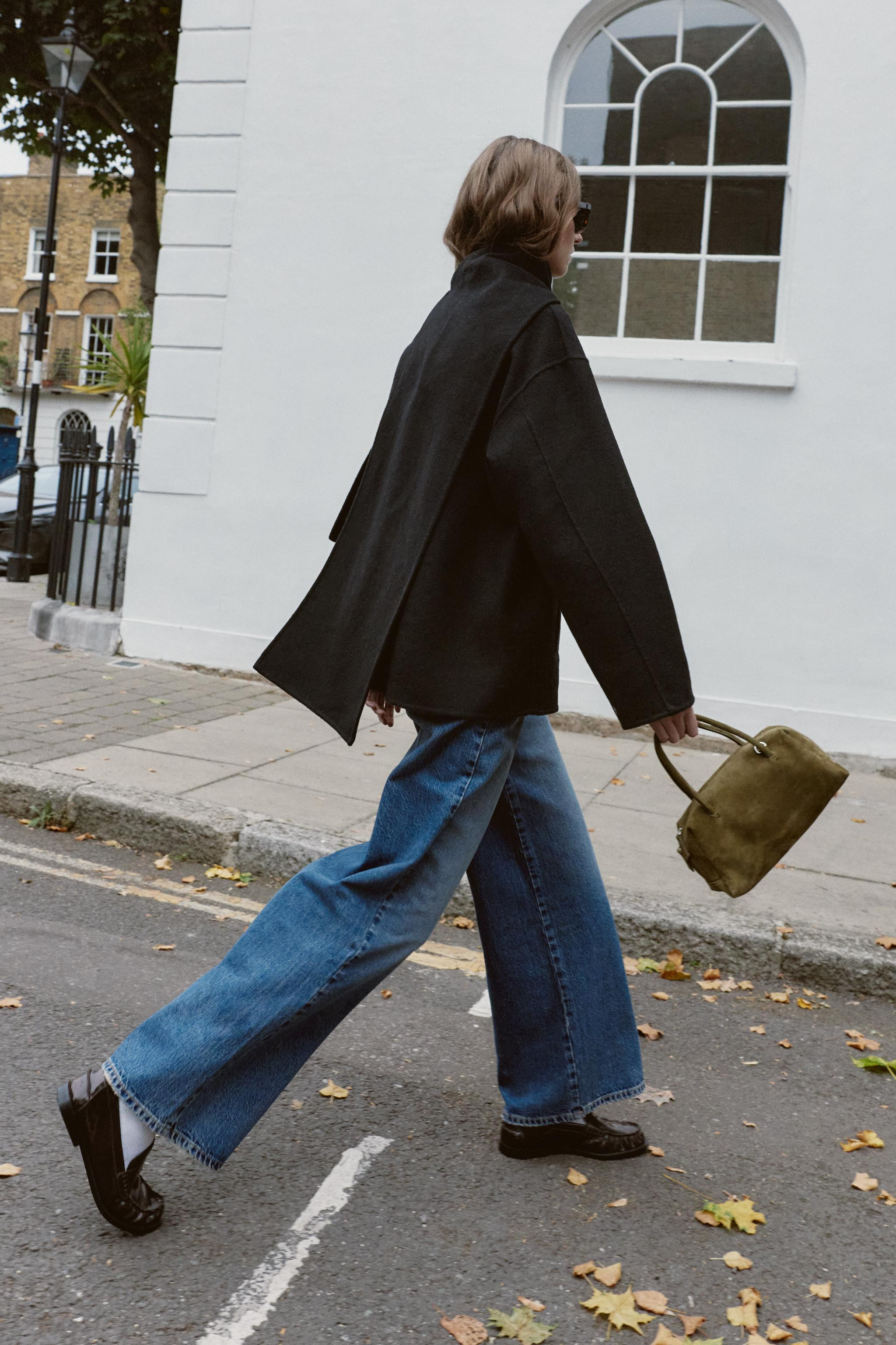 Coat made of wool blend fabric. Round neckline with detachable scarf and long sleeves. Front welt... | Zara US