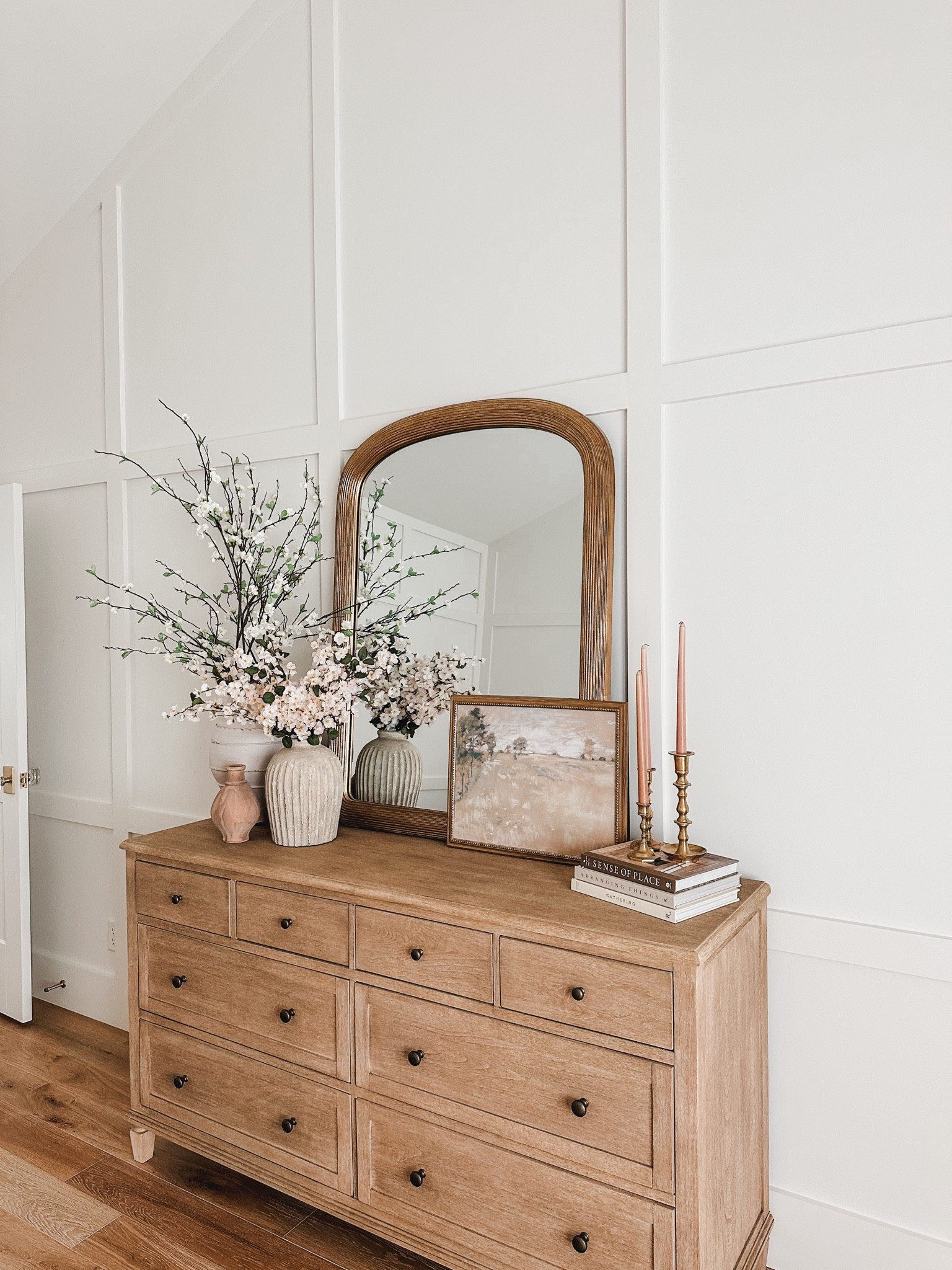Neutral wood tone Pottery Barn dresser style with gold detail, faux florals, and neutral decor books!

Home refresh, furniture favorites, Pottery Barn style, neutral wood tones, gold mirror, decor book, canvas art, faux florals, dresser style, vase favorites, gold detail, tapered candle, pops of pink, creamy whites, neutral home, aesthetic finds, shop the look!

#LTKSeasonal #LTKStyleTip #LTKHome