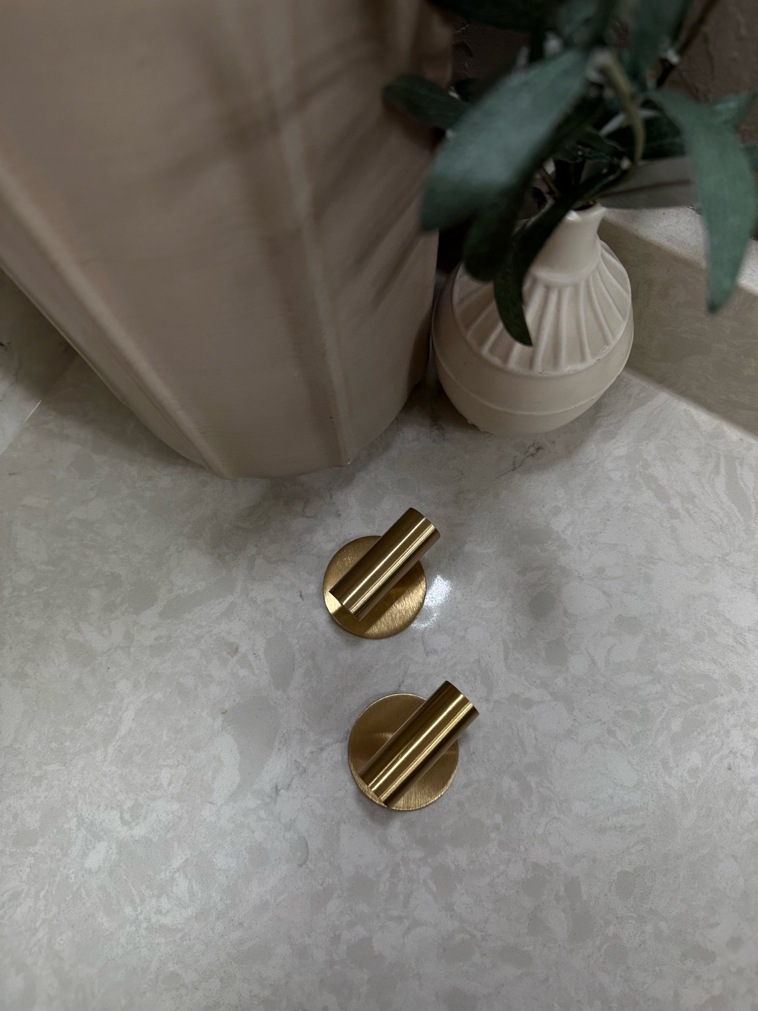 Gold peel and stick command hooks for bathroom towels or robes 

#LTKstyletip #LTKhome #LTKfindsunder50