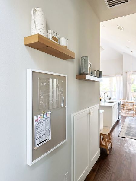 Proof that even a small narrow hallway can be functional! I created a command center using a linen wrapped magnetic board. And floating shelves for all those kitchen items I like to keep at easy reach. 

#LTKHome