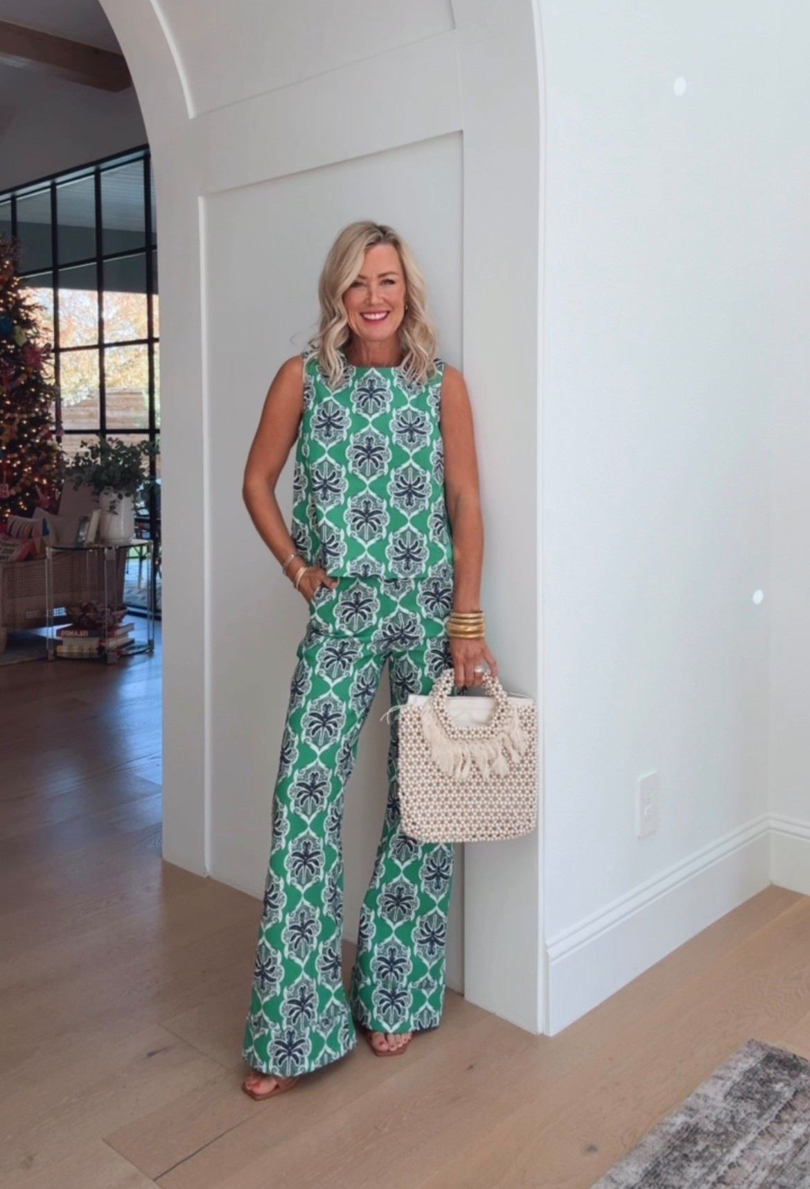 Darling retro-style resort set! Stretchy material with flared cuffed pant. 

Runs small, I sized up to a small  

#LTKootd #LTKSeasonal #LTKOver40