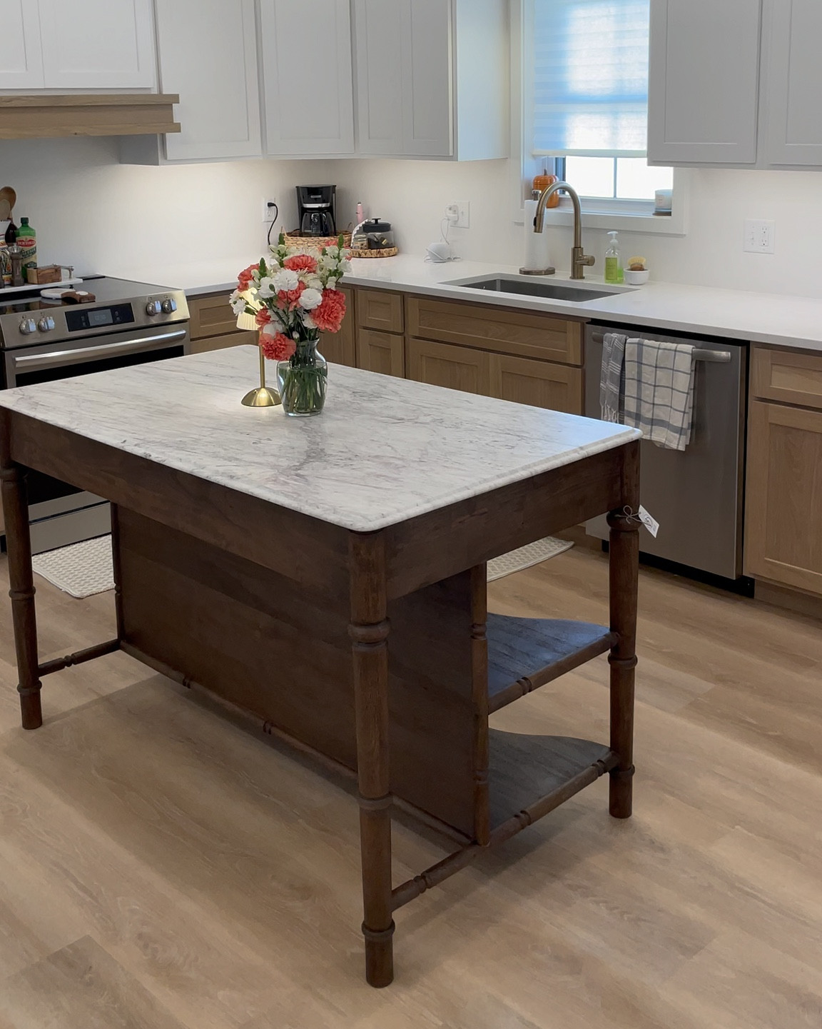 This Ballard Design Island is quite literally to die for. #freestandingisland #marbletopisland #primativeisland 

#LTKHome #LTKSaleAlert #LTKVideo