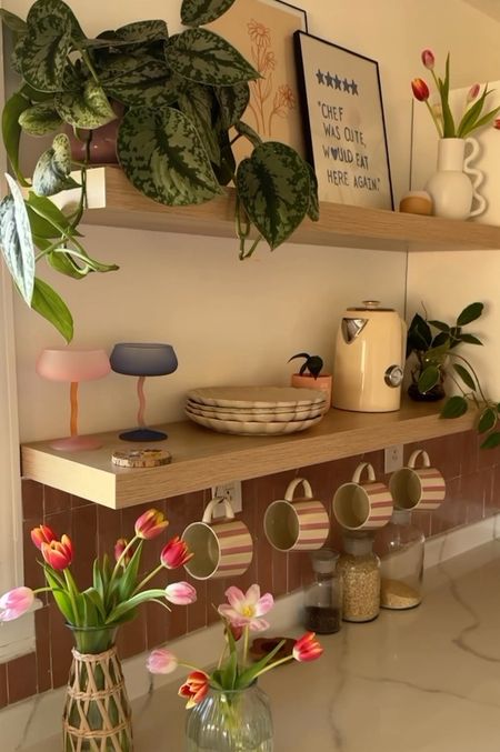 Open shelving decor idea for spring 🌸

boho decor, kitchen shelves, kitchen decor 

#LTKhome #LTKfindsunder100 #LTKsalealert