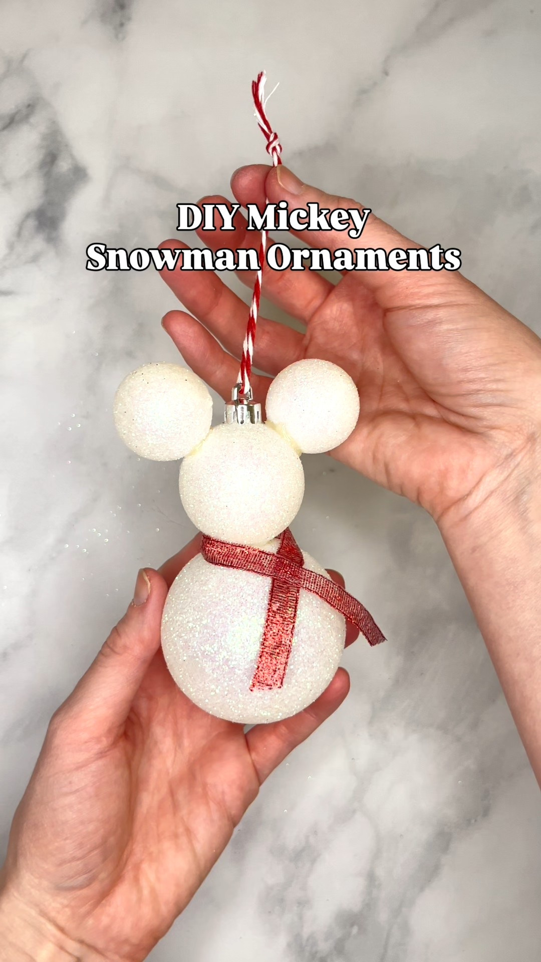 DIY Mickey snowman ornaments using shatterproof ornaments, a high temp mini glue gun, red ribbon, and red twine. These are a fun and easy Christmas craft!

#LTKSeasonal #LTKHoliday #LTKKids