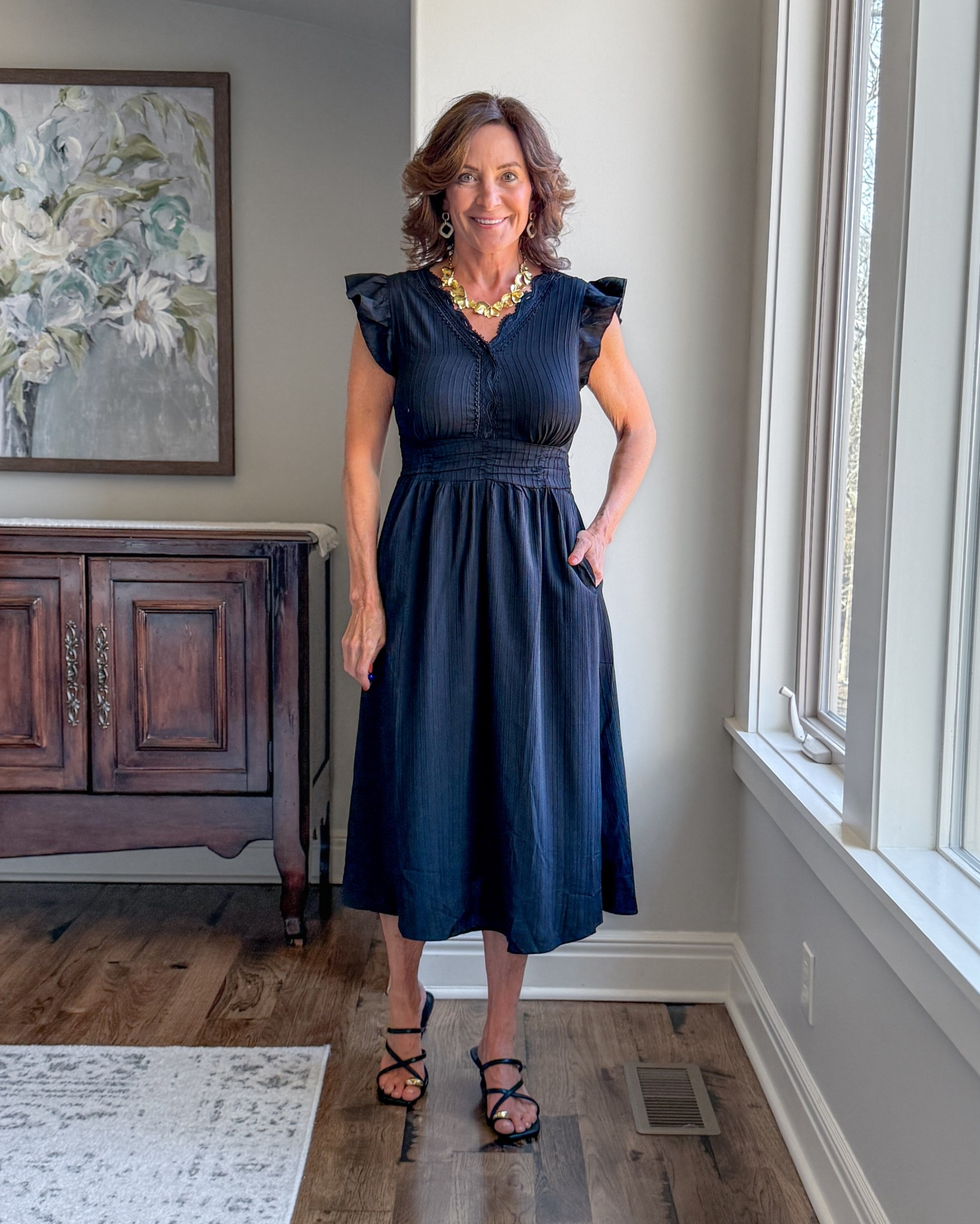 Black Midi Dress with Feminine Detail for Spring

This is one of those easy dresses that works for everything—casual days, dinner out, or travel. The flattering waist, soft fabric, and subtle ruffle detail give it shape without feeling fussy. Just add simple sandals or dress it up with accessories.

#SpringStyle #MidiDress #Over50Style #AmazonFashion #EffortlessStyle