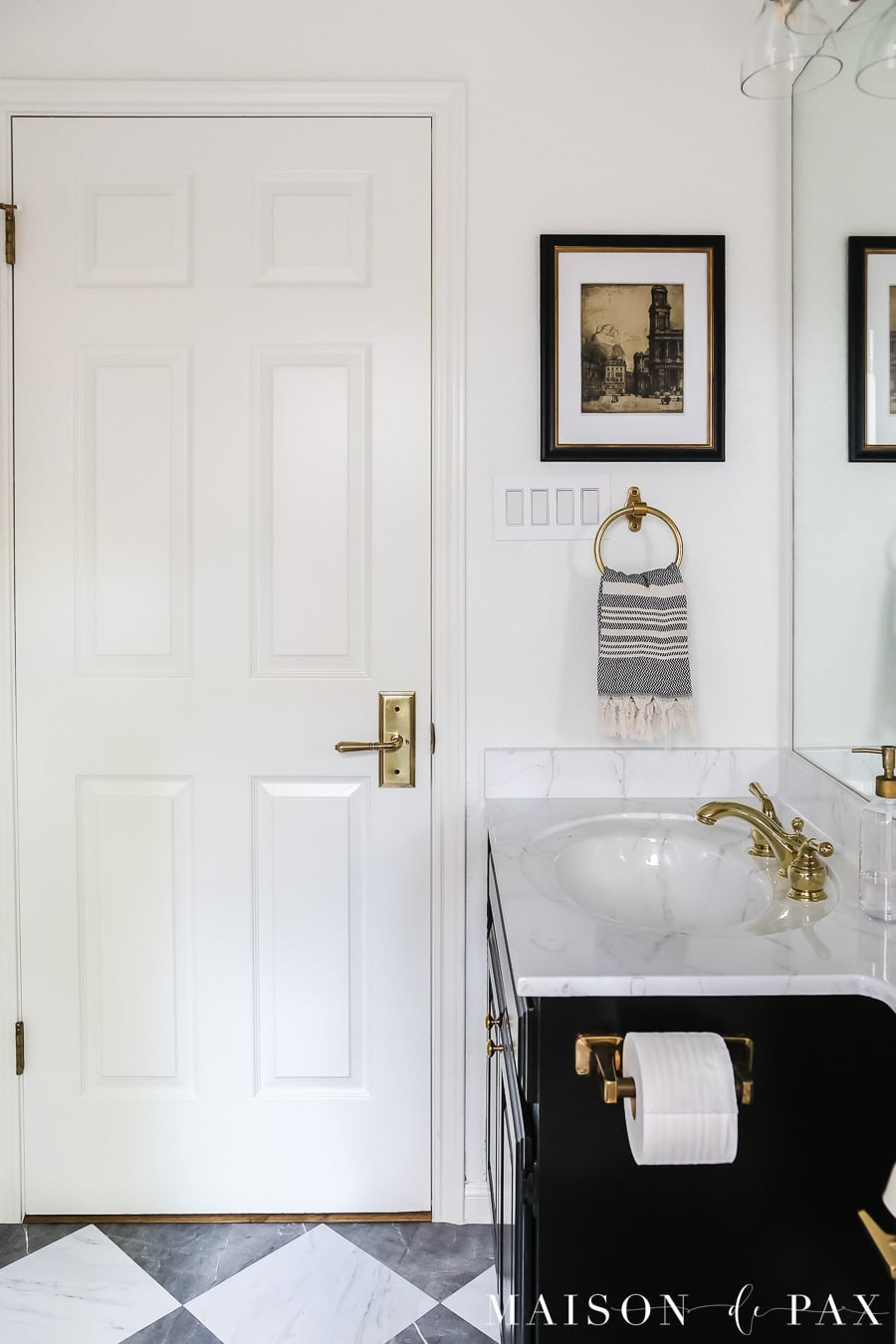 Some of my favorite details in this space: marble-look floor tile, striped hand towel, glass soap dispenser, brass towel ring, globe light fixture, and classic cabinet knobs. 

Just a few simple swaps that make the whole bathroom feel more polished!

 

#LTKHome