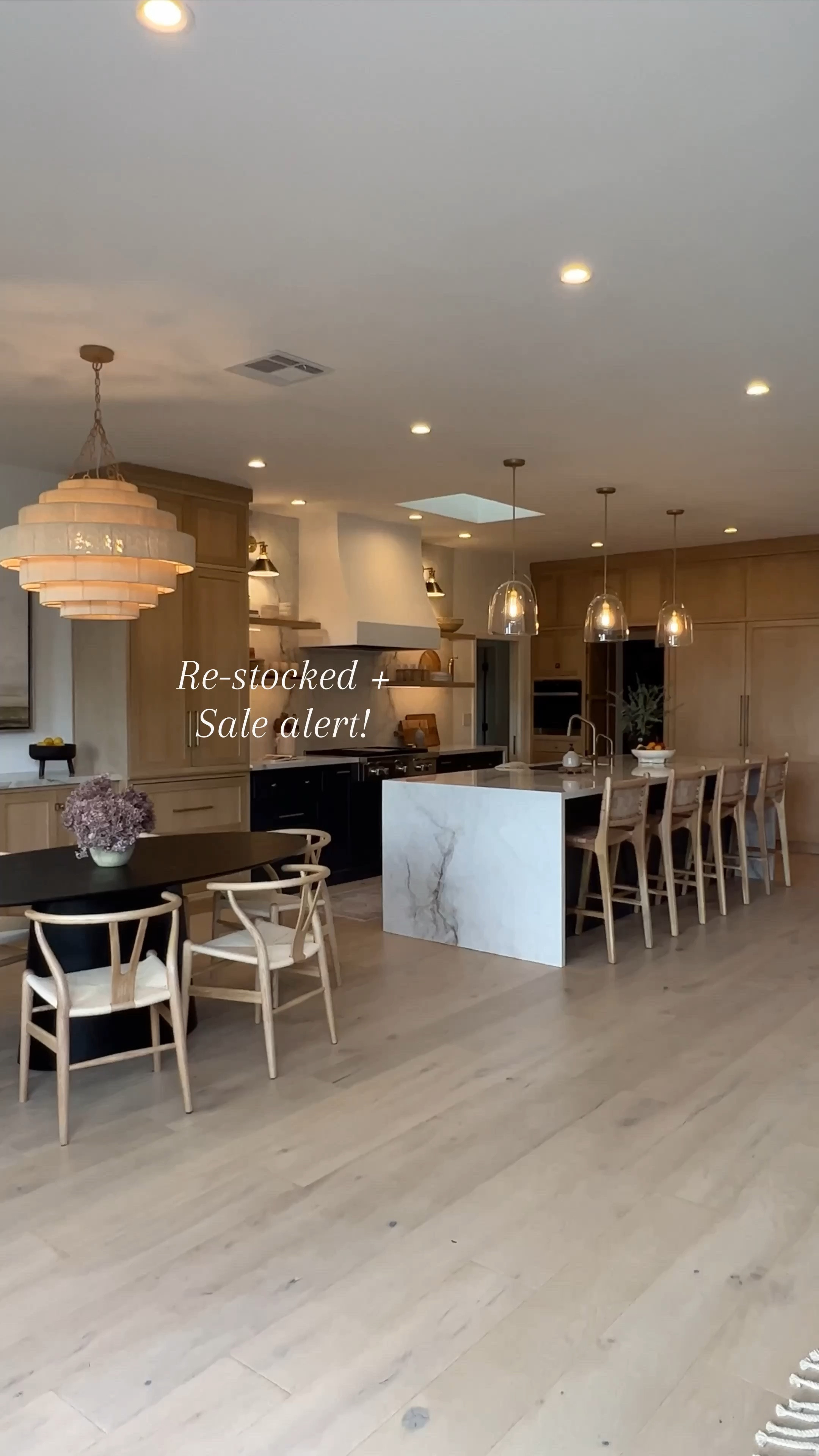 Kitchen design, black dining table, counterstools, chandelier, kitchen accessories, palecek, hati home, Amazon  wishbone, kitchen sink, Undermount, dark sink, Chairs, leather counter stools bronze sconce, brass, sconce, glass, pendant, lights, landscape arts, kitchen sink, brass, kitchen, faucet, picture, hydrangeas, jug, #ltkmostloved