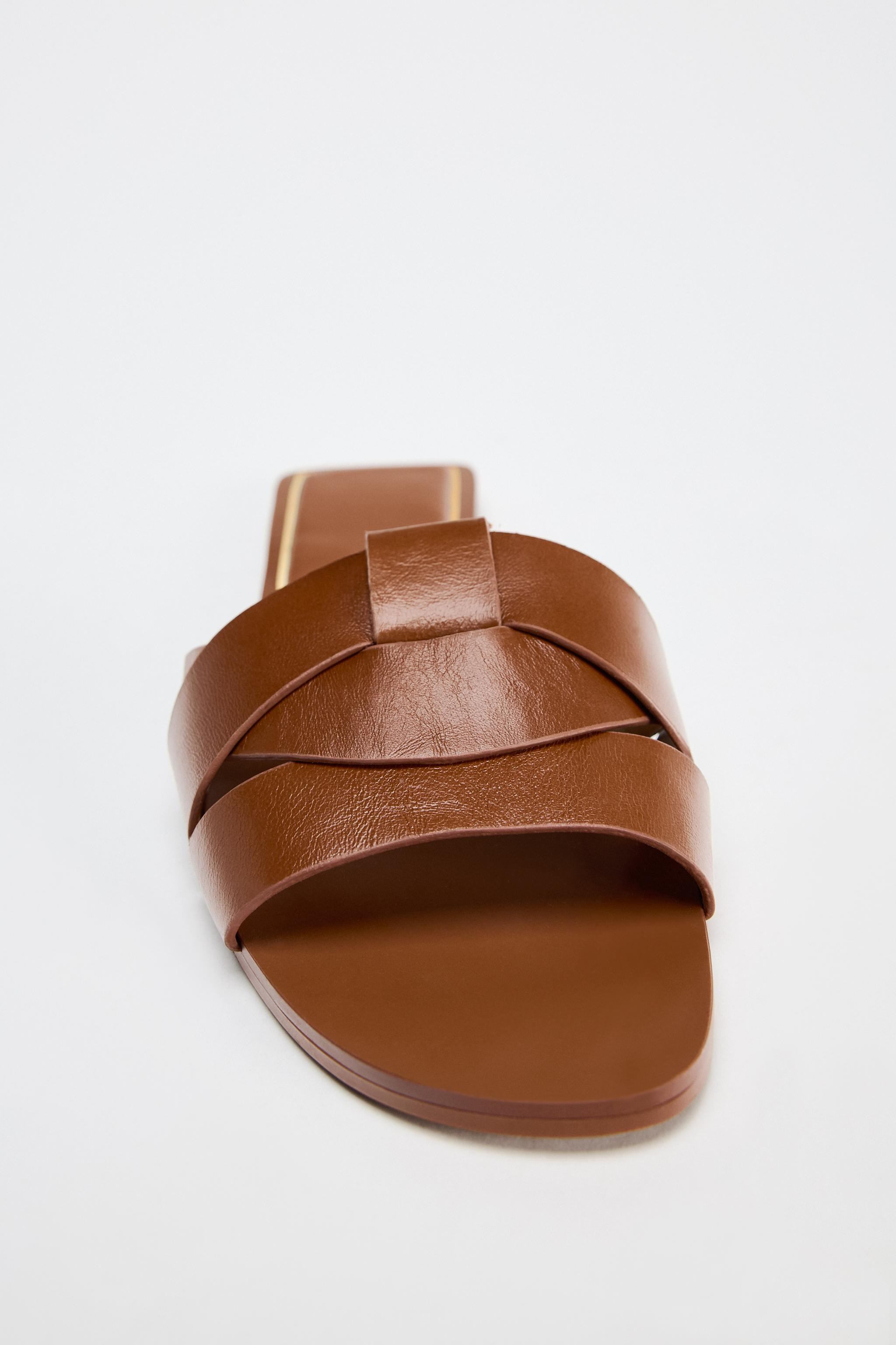 Flat leather slider sandals with criss-cross straps on the front.Sole height: 1 cm. / 0.3″ | Zara UK