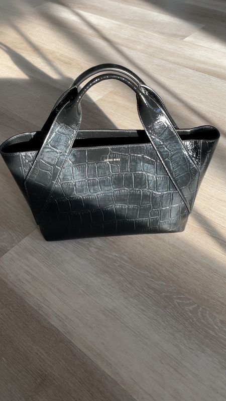 Anine Bing sale! 🚨  One of my favorite tote bags is on sale! So chic and luxe—love the croc embossed texture. Comes with a removable strap for maximum versatility. Love the full zip top closure. It’s spacious inside for all your everyday necessities and fits a laptop. Perfect for your everyday carryall, work and travel. 

Tote bag, tote, purse, work tote, sale, Anine Bing, The Stylizt 



#LTKItBag #LTKVideo #LTKSaleAlert