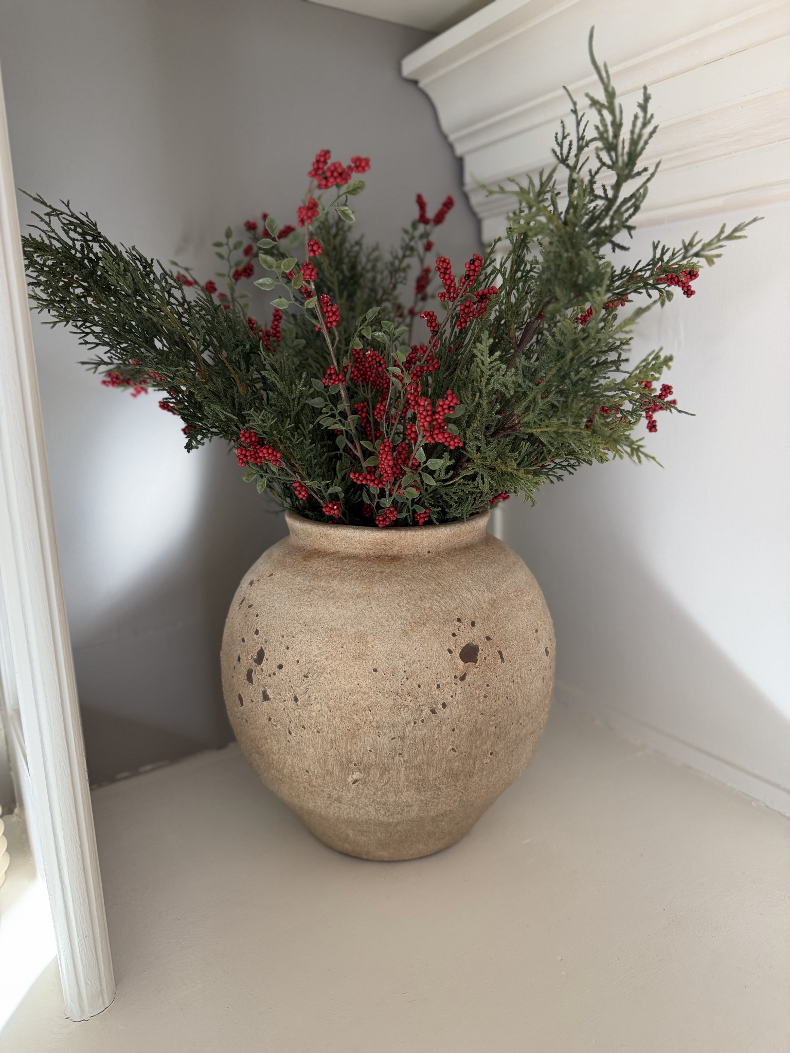 One of these berry bundles is four different stems so I bought one and separated them to mix with these pine stems!

The pot is from Hobby Lobby SKU 2493922

#LTKStyleTip #LTKHoliday #LTKHome