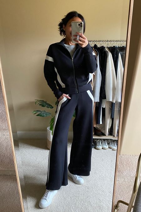 Travel outfit  Popular wide leg pants track pants have just been restocked for third time. I take true to size in Petite length at about 5’4”. If in between sizes you could size down. 
Code NAOMIXSPANX to save  

#LTKtravel #LTKstyletip #LTKover40