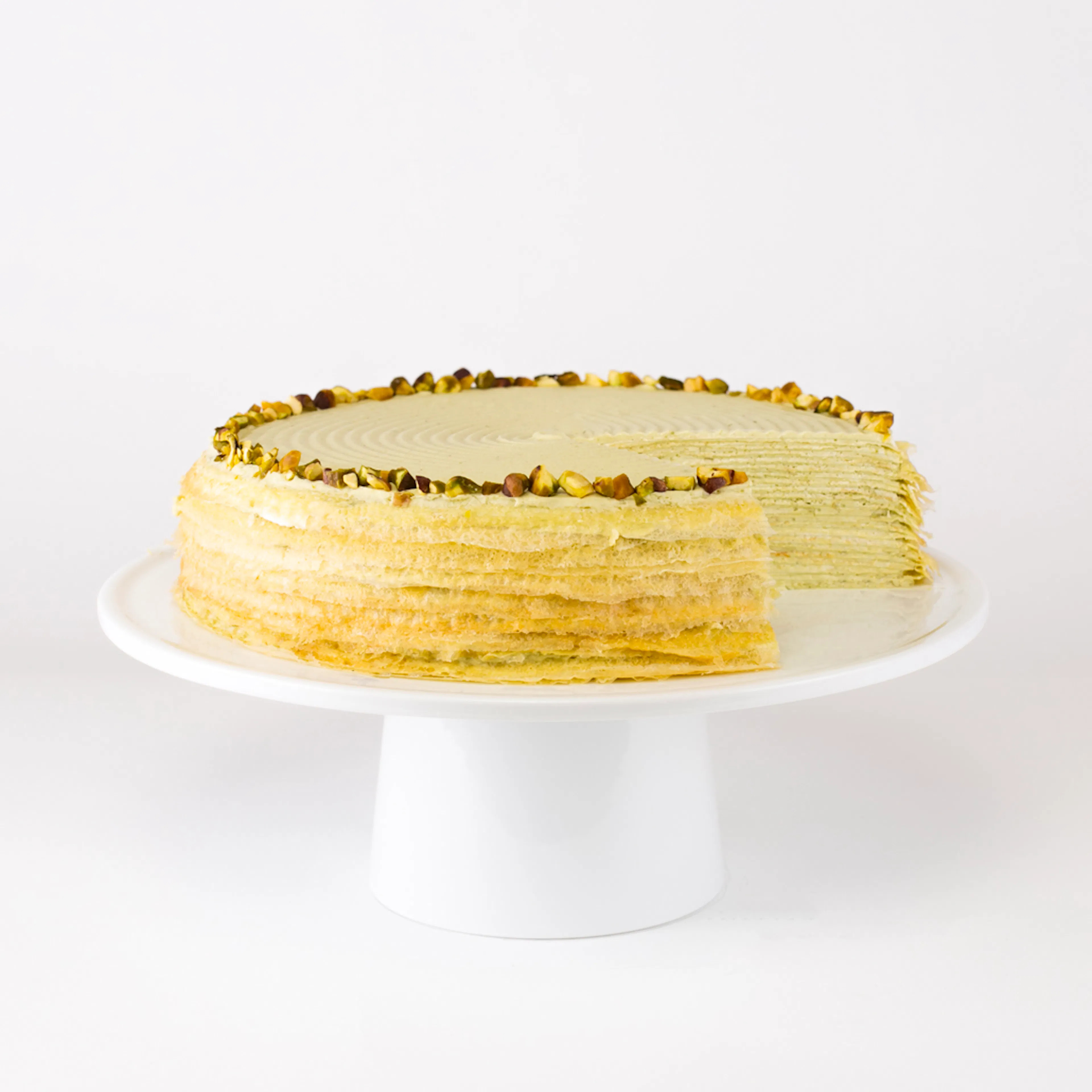 Pistachio Mille Crêpes Cake by Lady M Confections | Goldbelly | Goldbelly