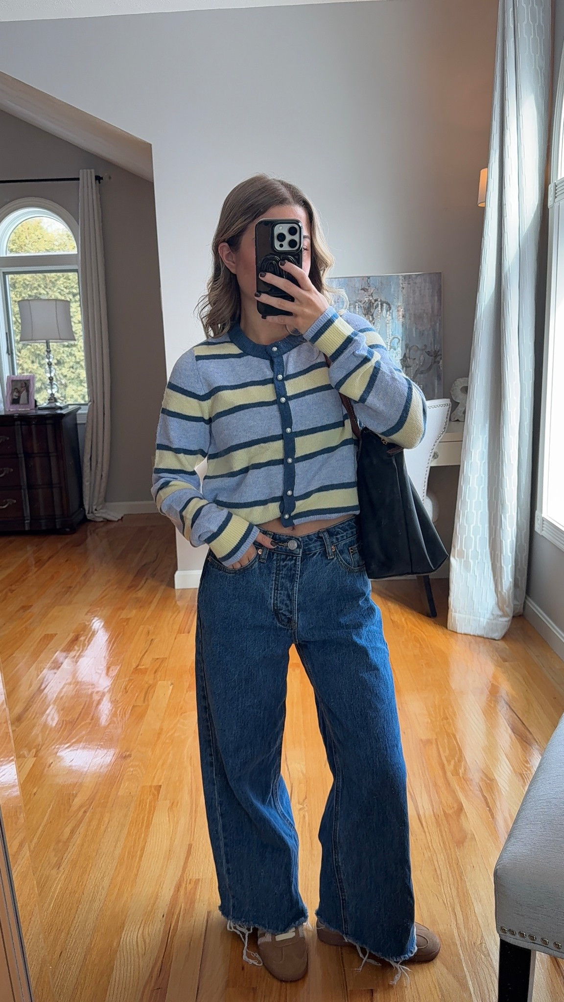 wearing a 23 in jeans and xs in sweater

#LTKU #LTKSeasonal #LTKootd