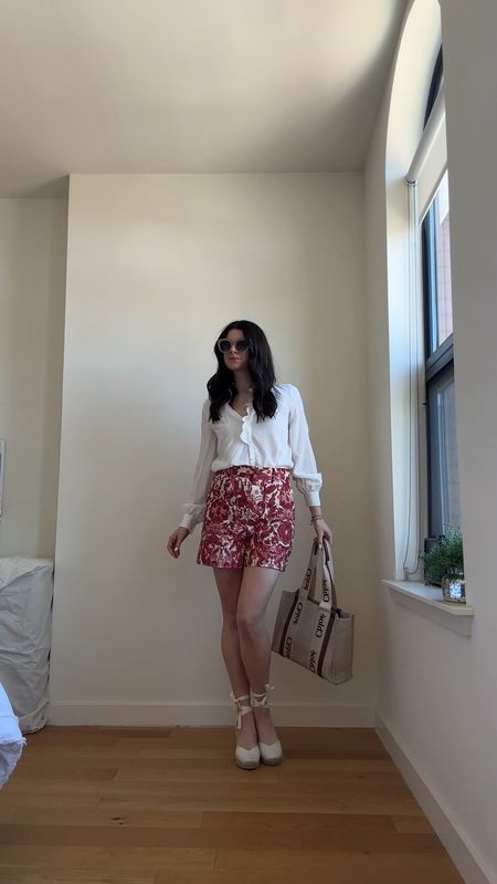 Styling my new Sézane spring skirt and floral shorts. French fashion, styling tips, spring outfits, spring outfit idea, tailored shorts, printed skirt, wrap skirt, white blouse, white boots, Chloe tote

#LTKstyletip #LTKVideo