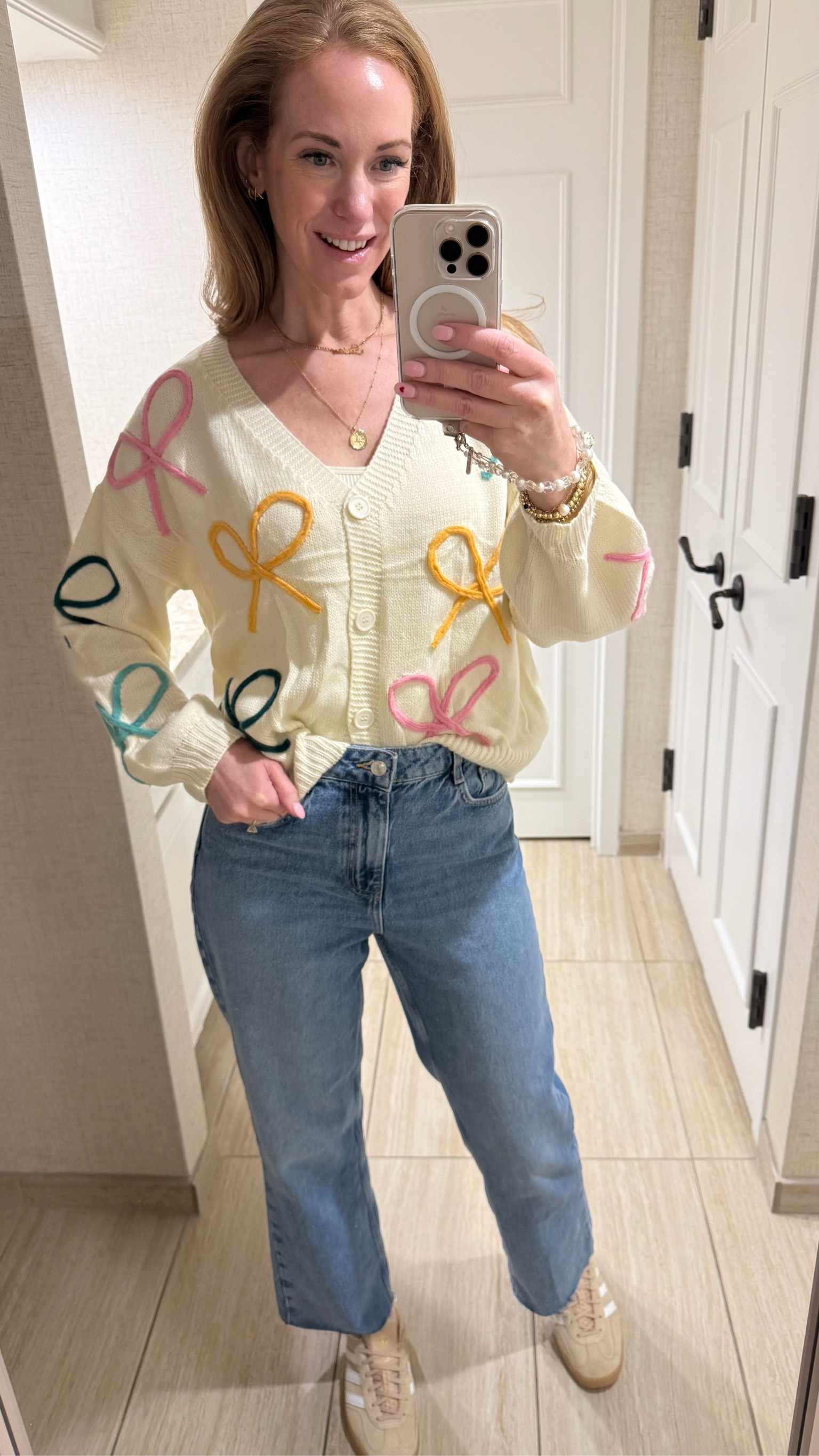 How cute is this bow cardigan from Amazon?! It’s a little oversized and so perfect for spring. I’m in a size small. And also wearing my new favorite Zara jeans and  neutral Samba’s.

#LTKFindsUnder50 #LTKStyleTip #LTKSeasonal
