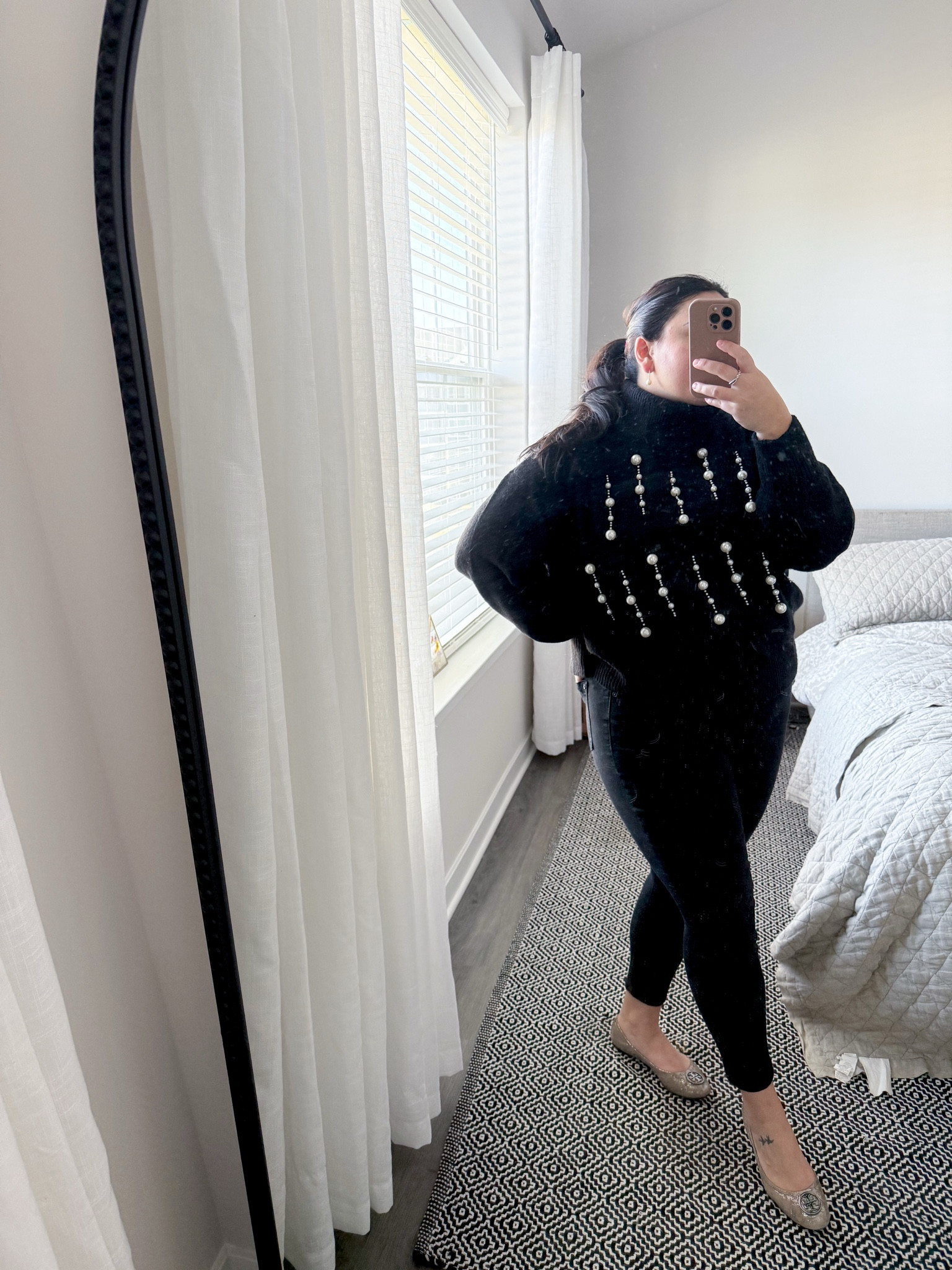 Wore this all black fit to my office work party. It’s an informal, daytime event but I wanted to still look classy in this Karl Lagerfeld sweater I got from Saks Off 5th last year, these silver Tory Burch flats and my go-to work pants (size 8 runs big) with some dangly pearl earrings to match 

#LTKMidsize #LTKWorkwear #LTKHoliday