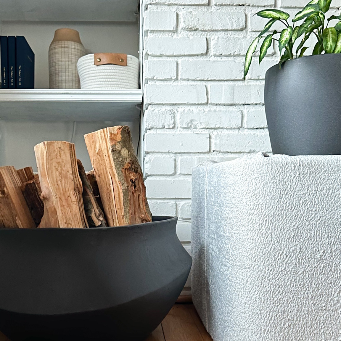 Switching up firewood storage with a basket 

#LTKhome