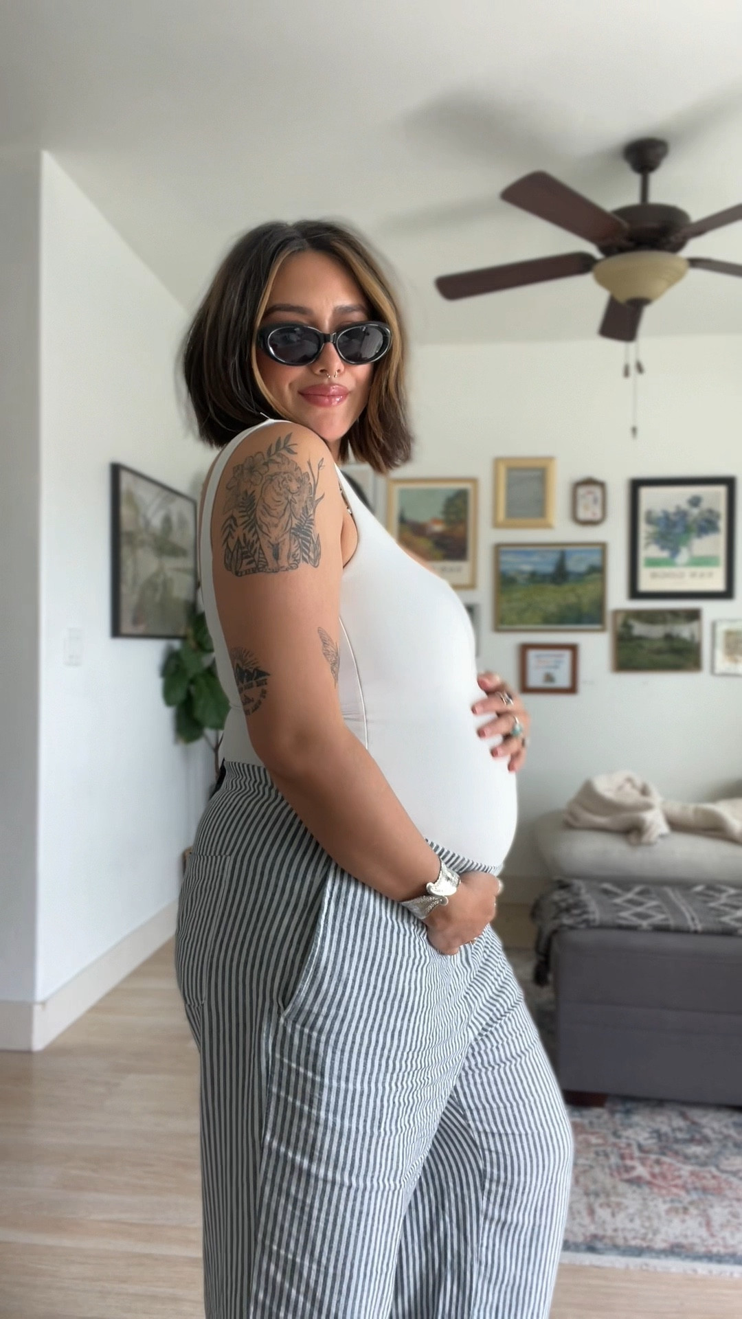 easy spring outfit with a good american body suit and old navy striped pants! wearing a size Large in the pants and medium body suit but i got this a while back and probably would prefer a large now. but it’s VERY SUPPORTIVE for my DDD+ girlies . 