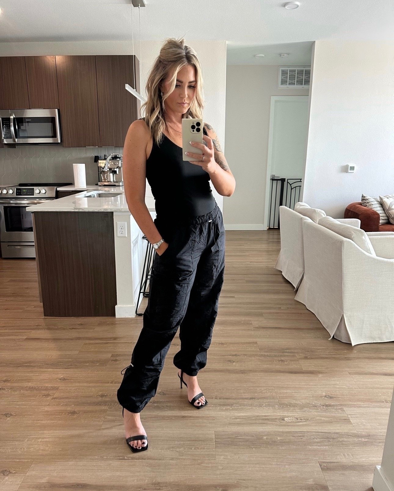 Black outfit | bodysuit | cargo | pants | parachute | heels | designer | fall

#LTKootd #LTKOver40 #LTKMidsize