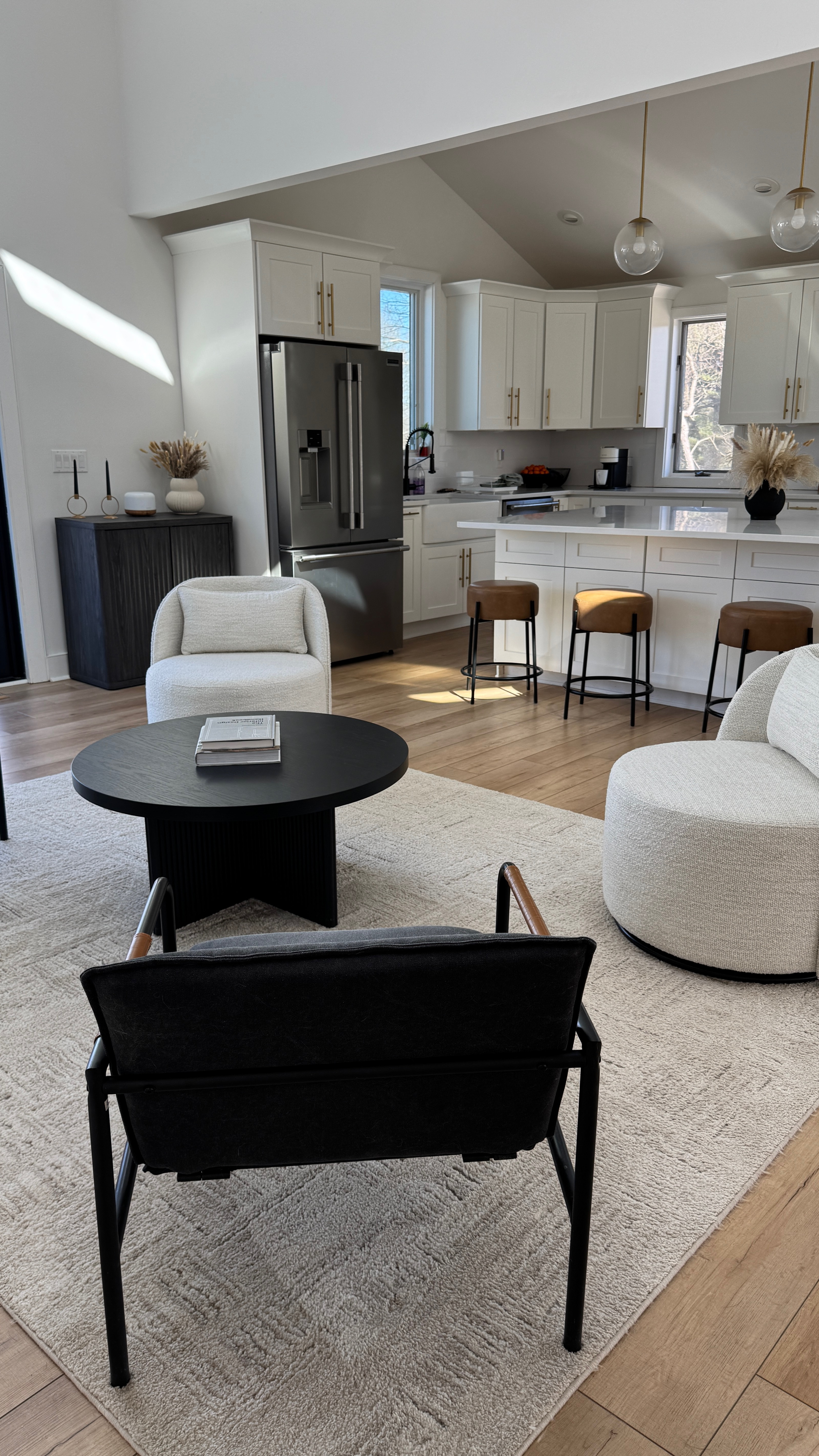 Living room refresh! I took a chance on these Boucle swivel accent chairs based on their size and they couldn’t be more perfect!!! I love the Boucle fabric and the pillow covers can be removed and washed. The swivel hardware is black and these were under $170 a piece. If you have a smaller space these are perfect and the backs are actually higher than i thought they’d be. 10/10! 
#walmart #walmartfind #accentchair #swivelchair #interiordesign #homefurniture 

#LTKHome #LTKStyleTip