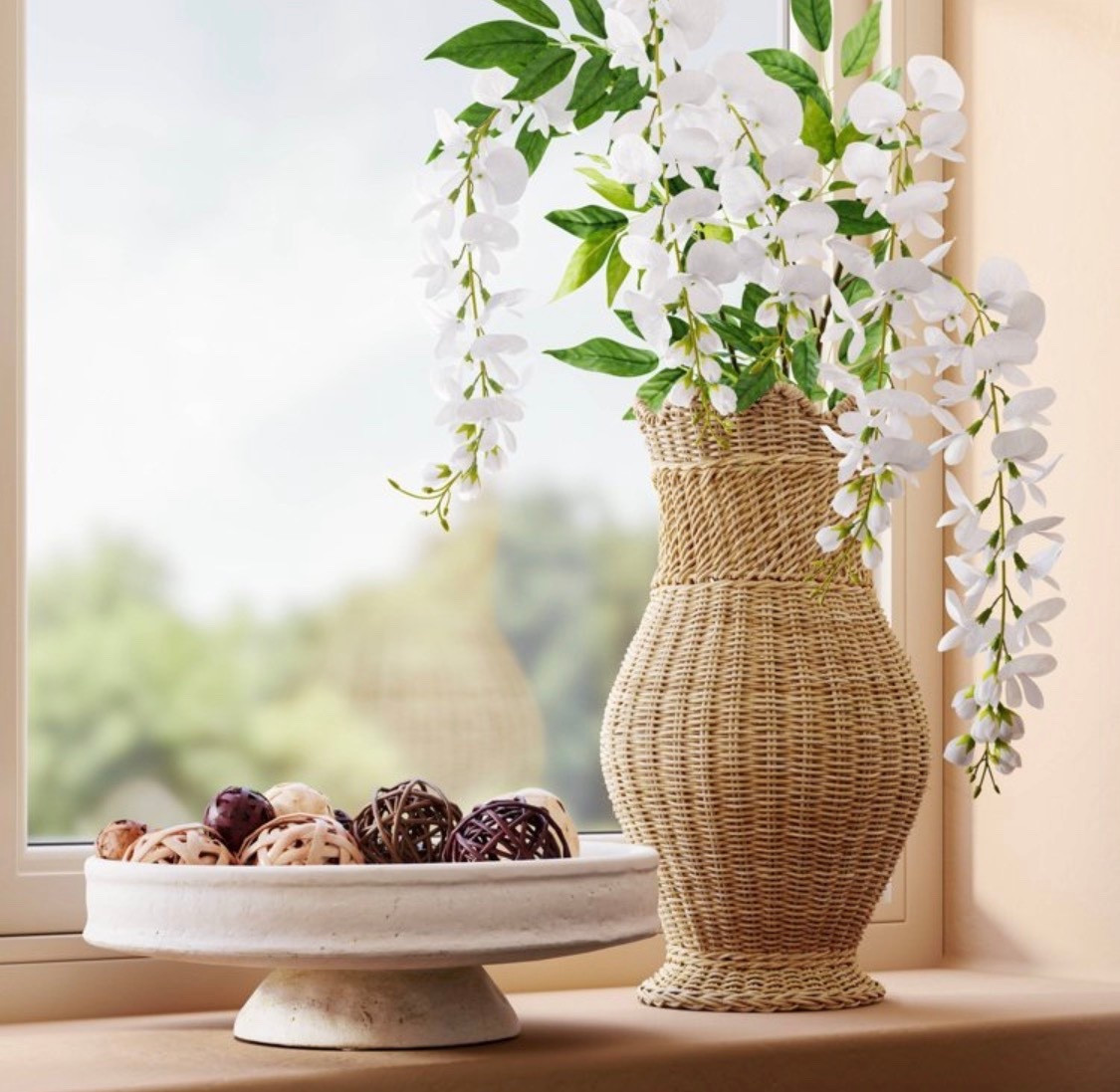Add a touch of countryside charm to your decor with this Scalloped Edge Woven Vase from Threshold™. Made of rattan, this vase features a woven design and scalloped edges for rustic style. The open top lets you easily add artificial greenery for a pop of color and style. Standing at 16 inches in height, this vase will make a great decorative addition to your home. 

#LTKSeasonal #LTKHome #LTKmomlife