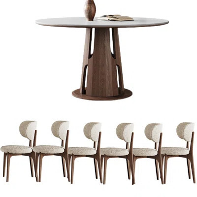 Minimalist Round Dining Table with Rock Panel | Wayfair North America
