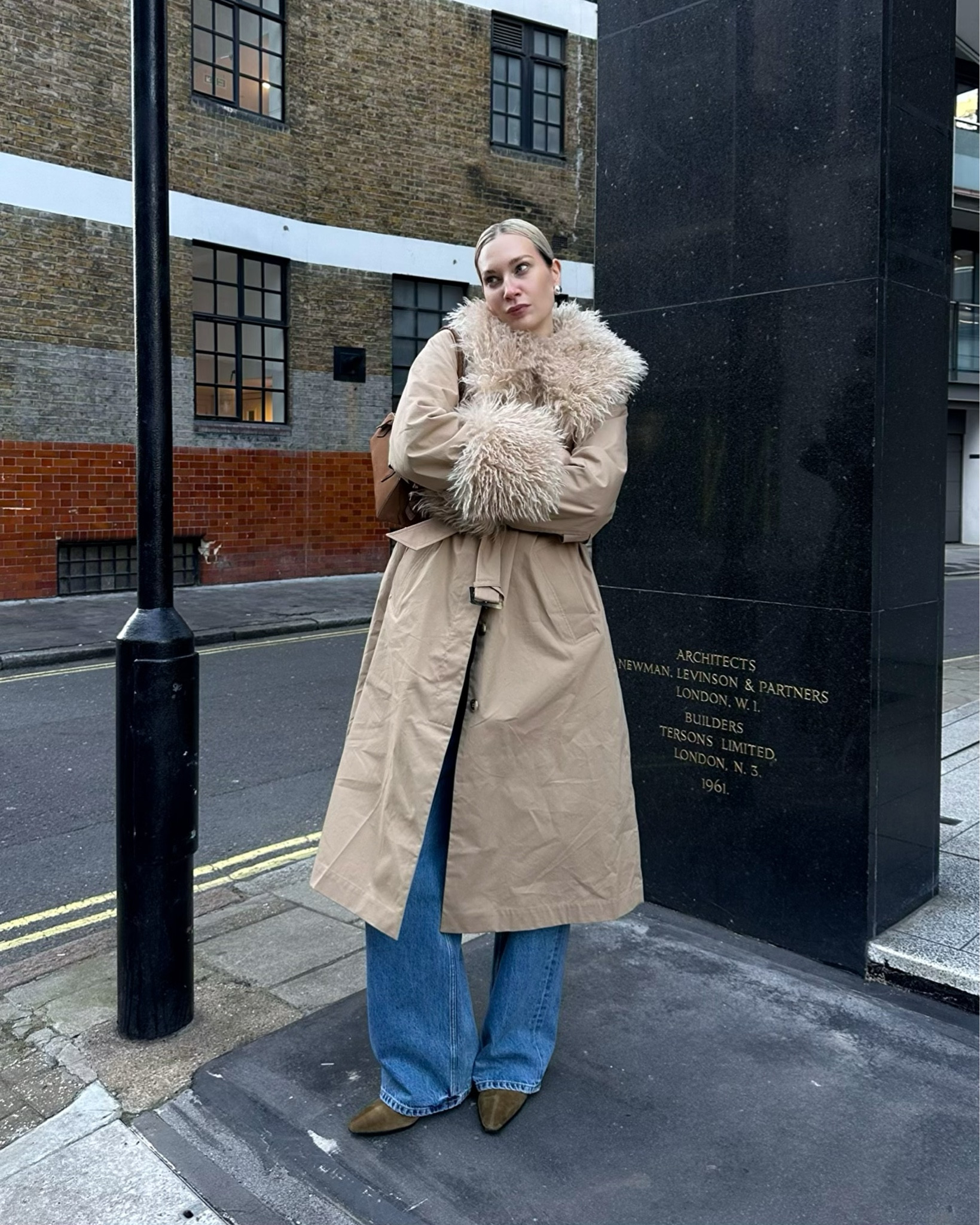 Trench coat season, but make it extra. This trench brings the drama with its oversized faux shearling collar and relaxed fit. Perfect for layering over denim and boots for an effortless look.

#LTKFashionMonth #LTKspring #LTKstyletip