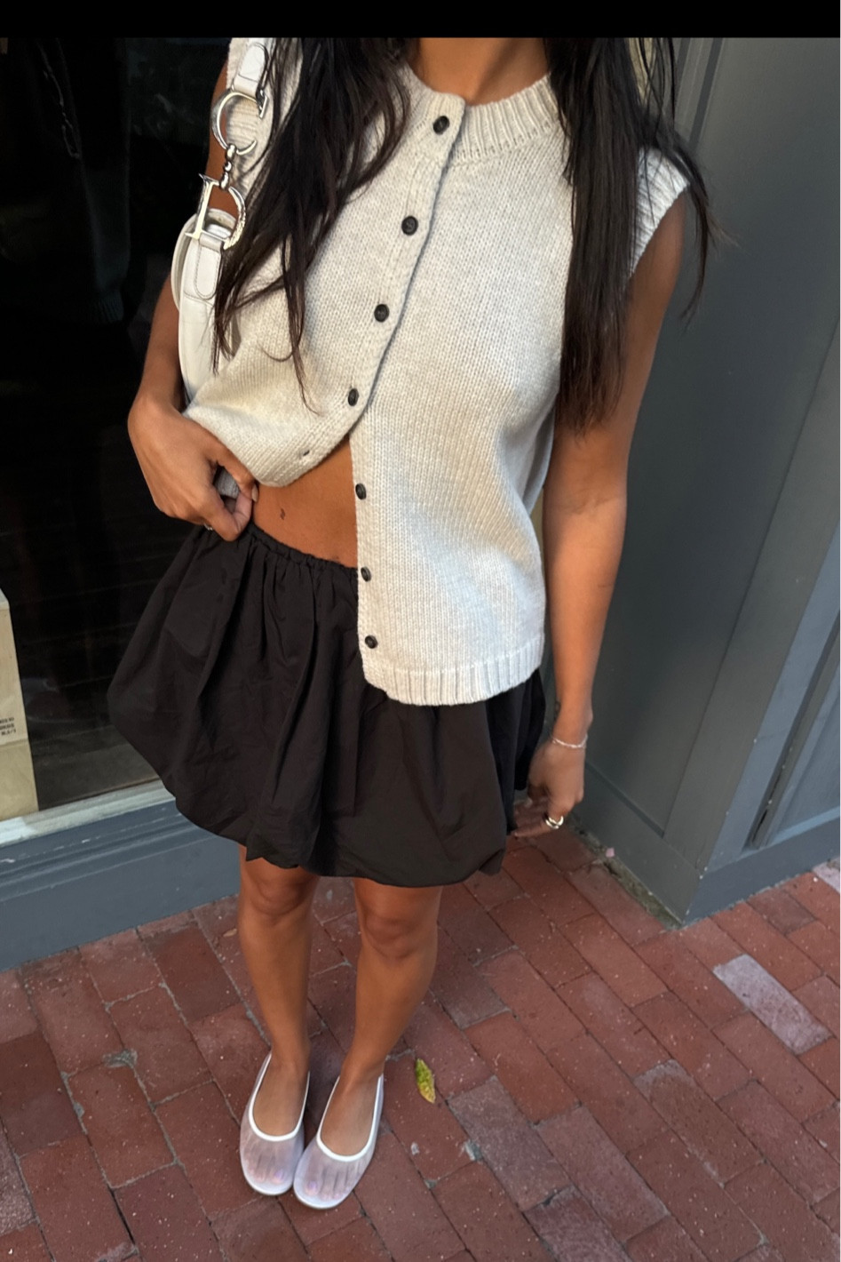 dissh summer vest and bubble skirt | summer outfit, travel outfit, grey knit vest, black mini skirt, white mesh flats 

#LTKShoeCrush #LTKWorkwear #LTKStyleTip