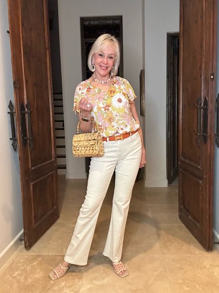 Floral print v- neck flutter sleeve top under $30. Worn with Chico’s off white Girlfriend flare jeans. Bamboo bag
Kendra Scott jewelryy

#LTKstyletip #LTKover40 #LTKfindsunder50