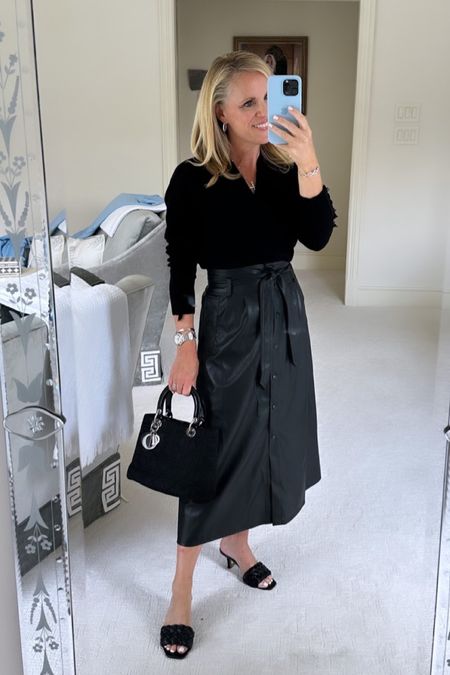 Perfectly polished, chic and classic 

Brochu Walker Fall collection
Cashmere V-neck sweater with fringe trim 
Faux leather midi skirt with paper bag, waist detail 
Black Lady Dior handbag with silver trim
Black woven mule sandals 
Everything fits true to size I am wearing an extra small 
I am 5’2” tall 

#LTKstyletip #LTKSeasonal #LTKitbag