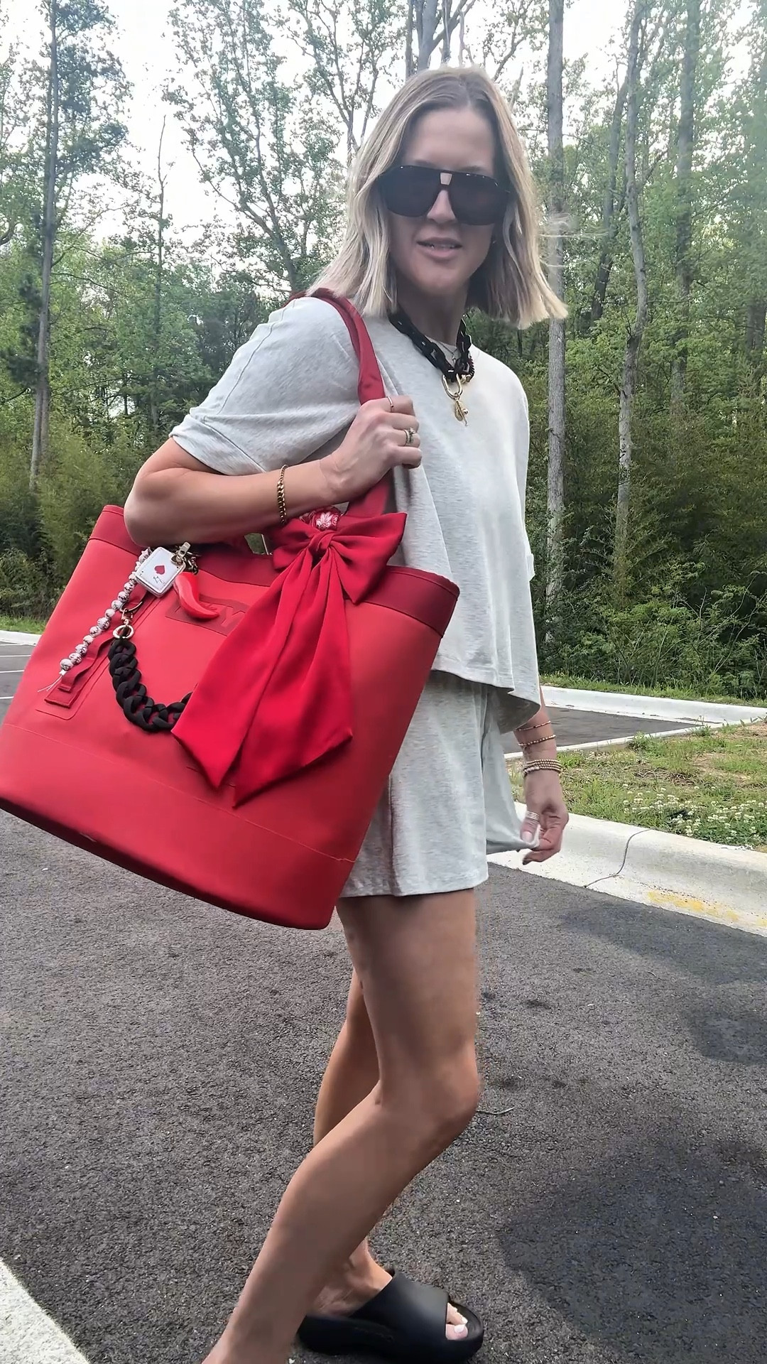 Baseball mom outfit today is the comfiest set! I’m 135lbs, 5’7 wearing a medium rolled at the waist. Prob should have done a small but still love! 
Necklaces and charms are from HIVE Designs Code EMILY15 

Sports mom, Game day outfit, matching set, comfy set, casual, ballpark outfit, Amazon find 

#LTKSeasonal #LTKootd #LTKmomlife