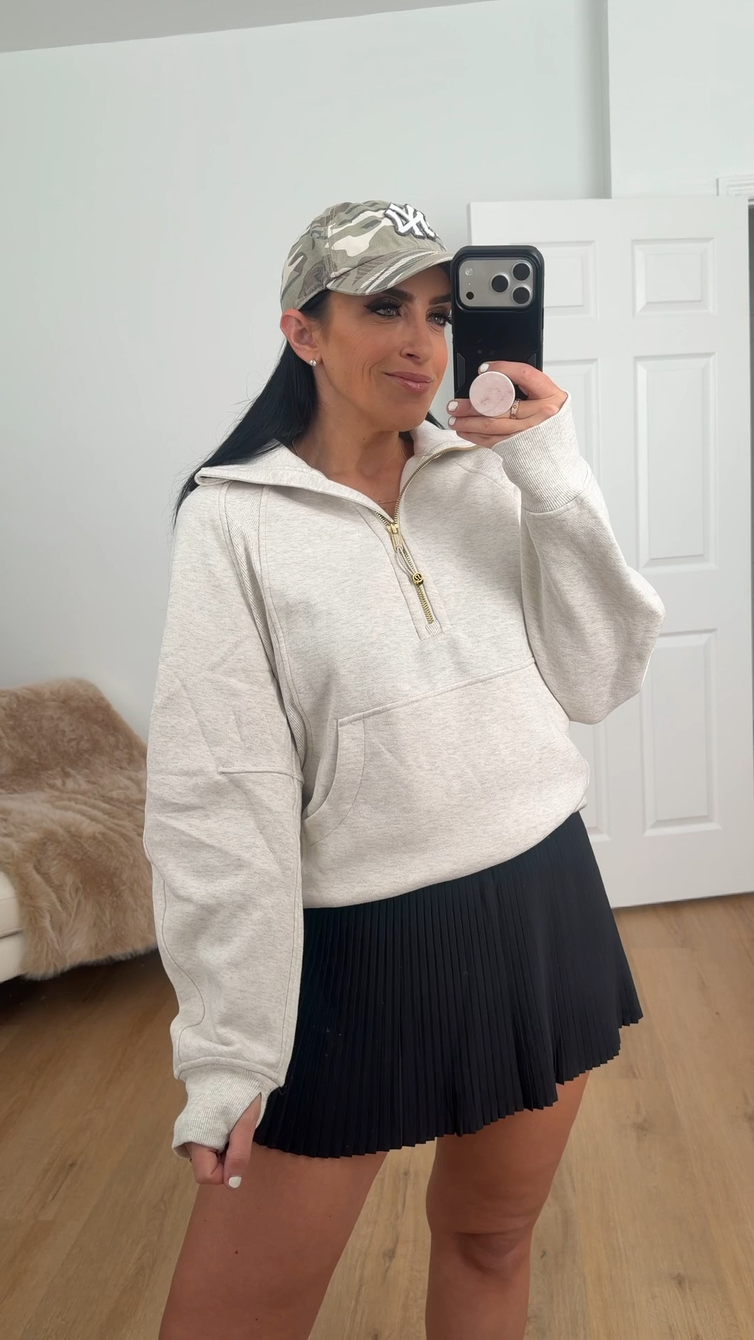 Lululemon varsity high rise pleated tennis skirt now $39 originally $88 in the color rock melon

Scuba oversized funnel neck half zip sweatshirt now $45 off in black 